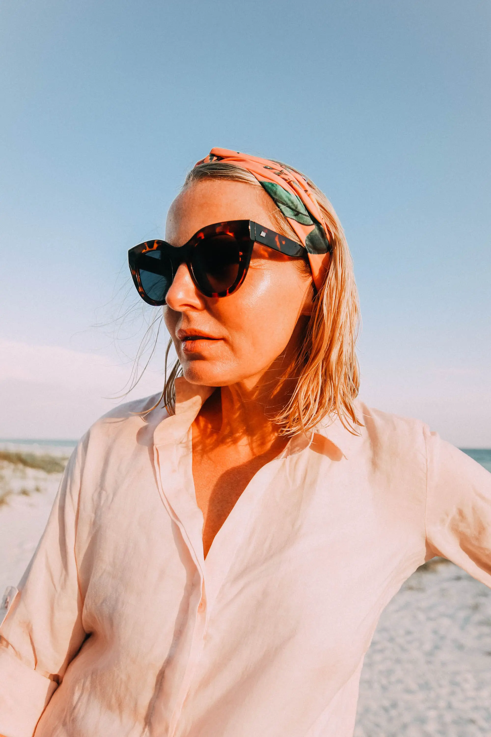 Hair Accessories, Fashion blogger Erin Busbee of BusbeeStyle.com wearing a floral headband at the beach in Florida