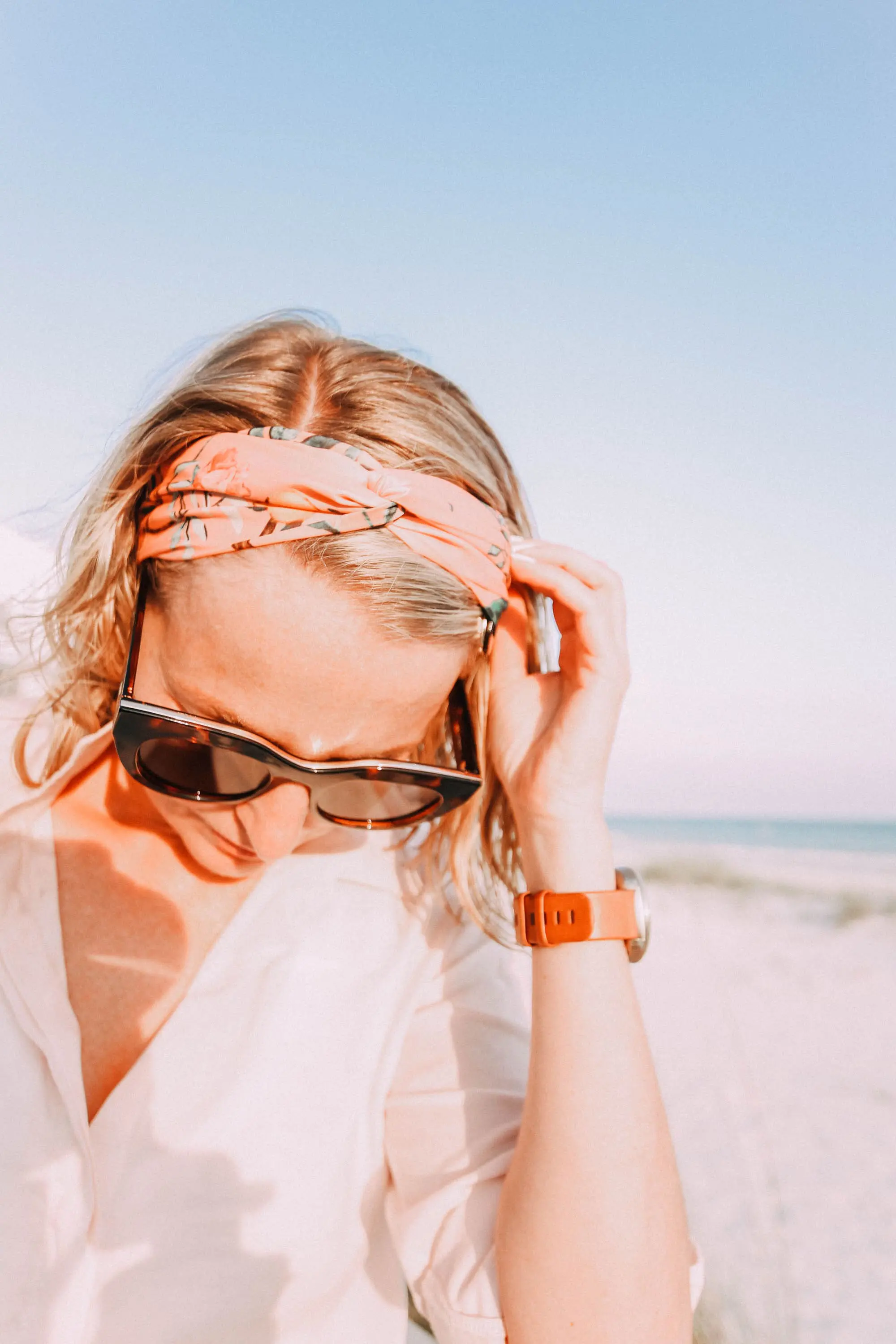 Hair Accessories, Fashion blogger Erin Busbee of BusbeeStyle.com wearing a floral headband at the beach in Florida