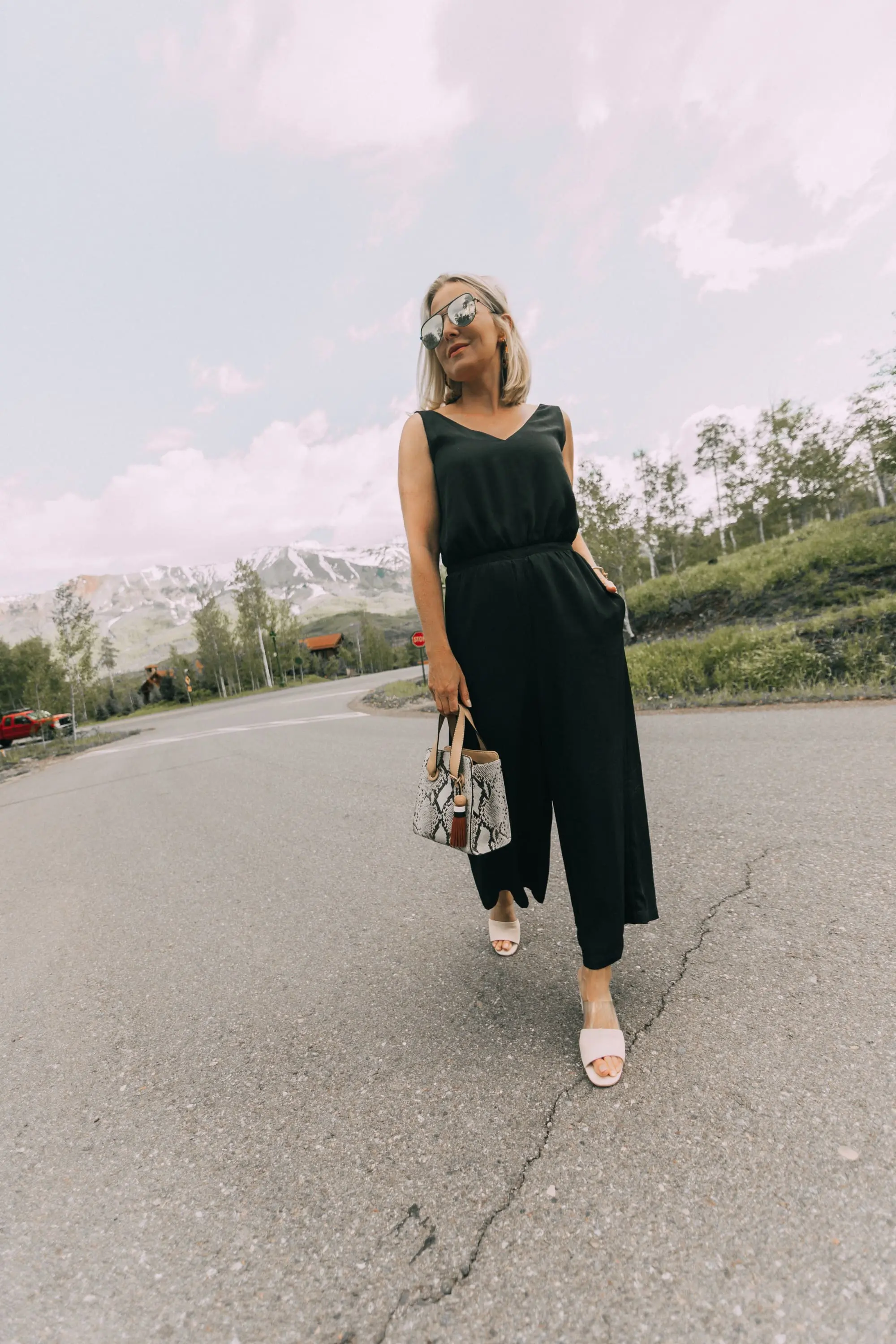 Lucite Trend, Fashion blogger Erin Busbee of BusbeeStyle.com wearing lucite mules from Vince Camuto with J Brand jeans, white Leith top, Hermes belt, and a python print Vince Camuto bag in Telluride, Colorado