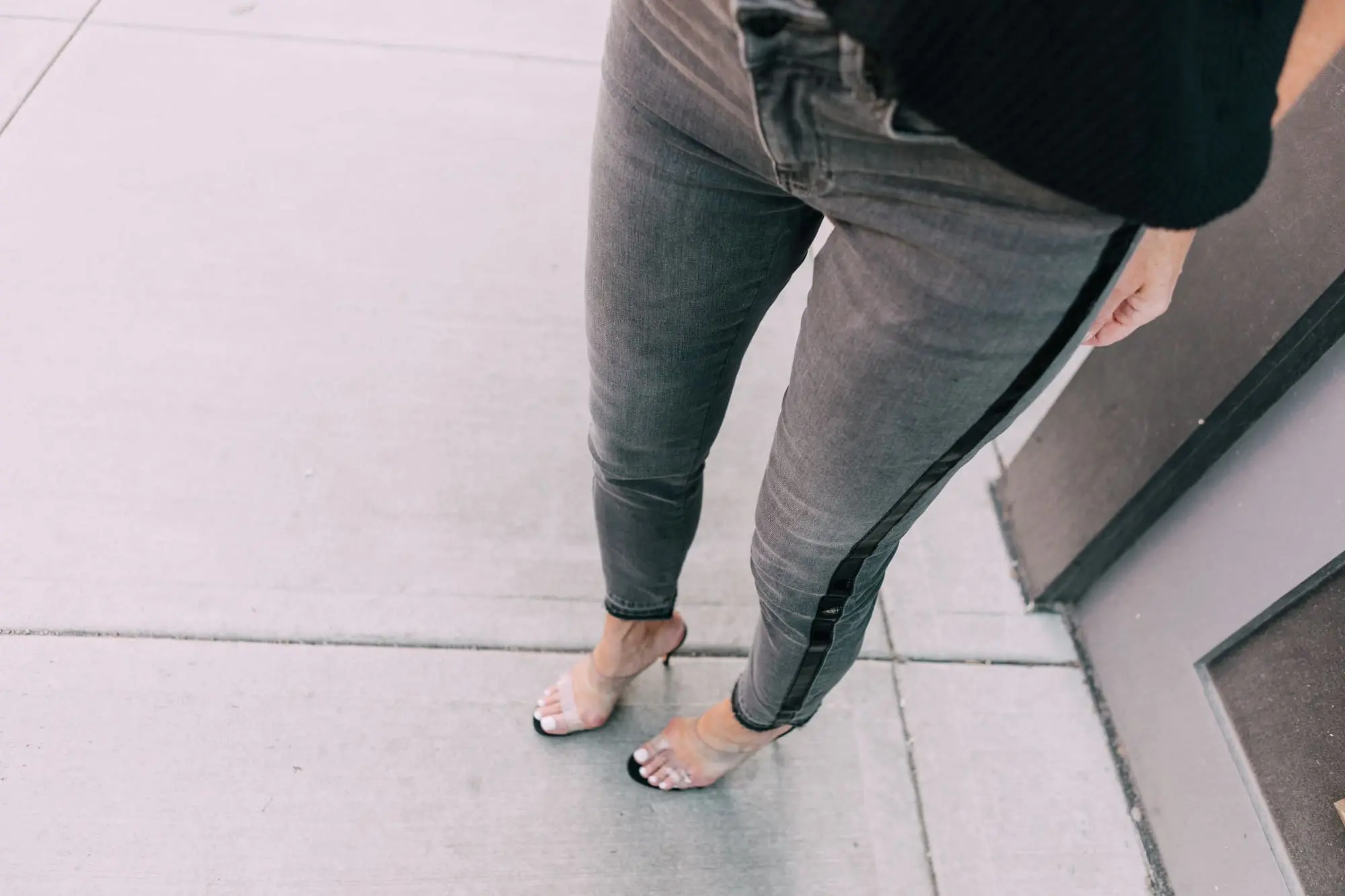 Striped Jeans, Fashion blogger Erin Busbee of BusbeeStyle.com wearing black patent striped jeans by Escada, waffle knit tee by Free People, bralette by Free People, heels by Schutz, and Chanel bag from Bloomingdale's in Telluride, CO