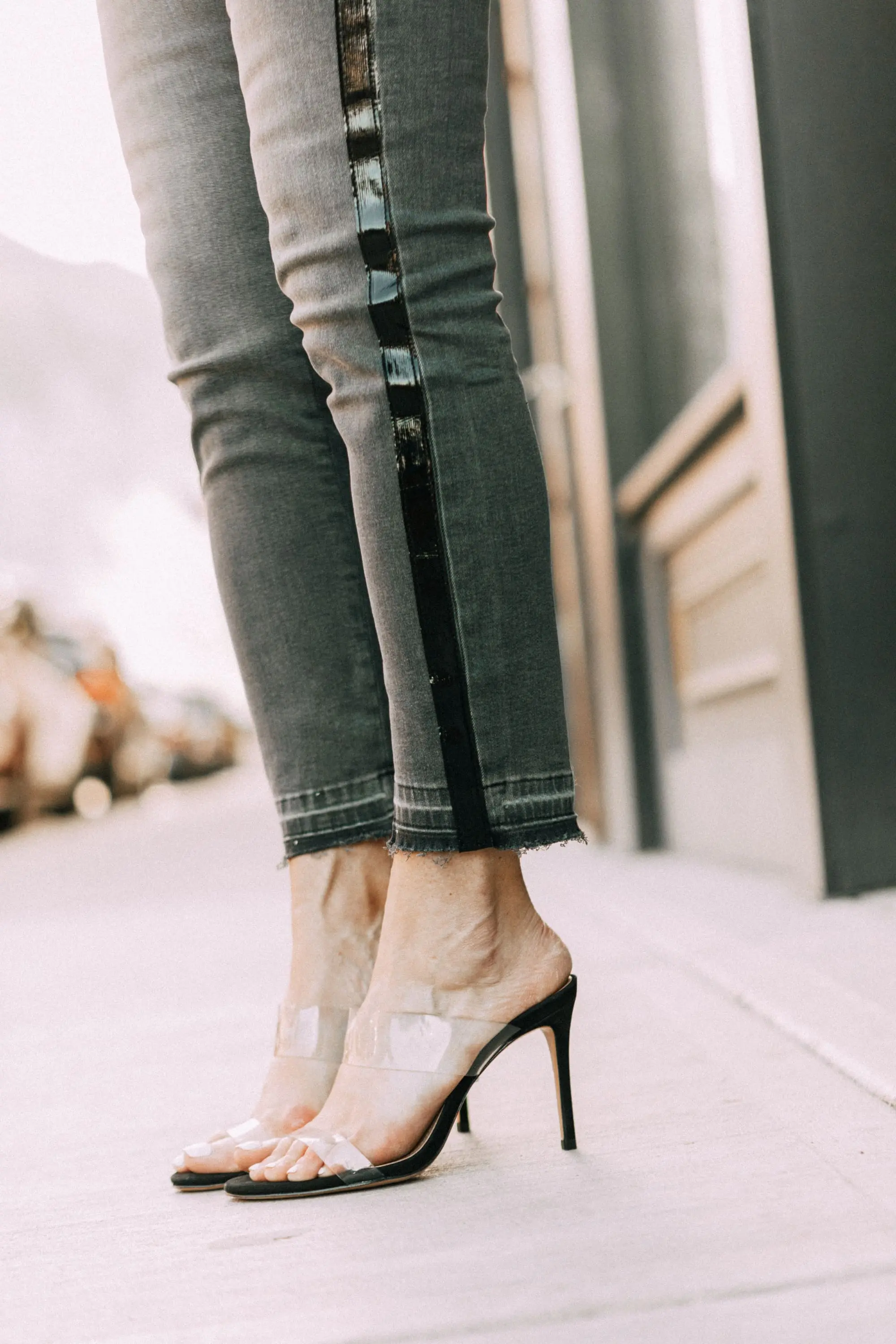 Striped Jeans, Fashion blogger Erin Busbee of BusbeeStyle.com wearing black patent striped jeans by Escada, waffle knit tee by Free People, bralette by Free People, heels by Schutz, and Chanel bag from Bloomingdale's in Telluride, CO