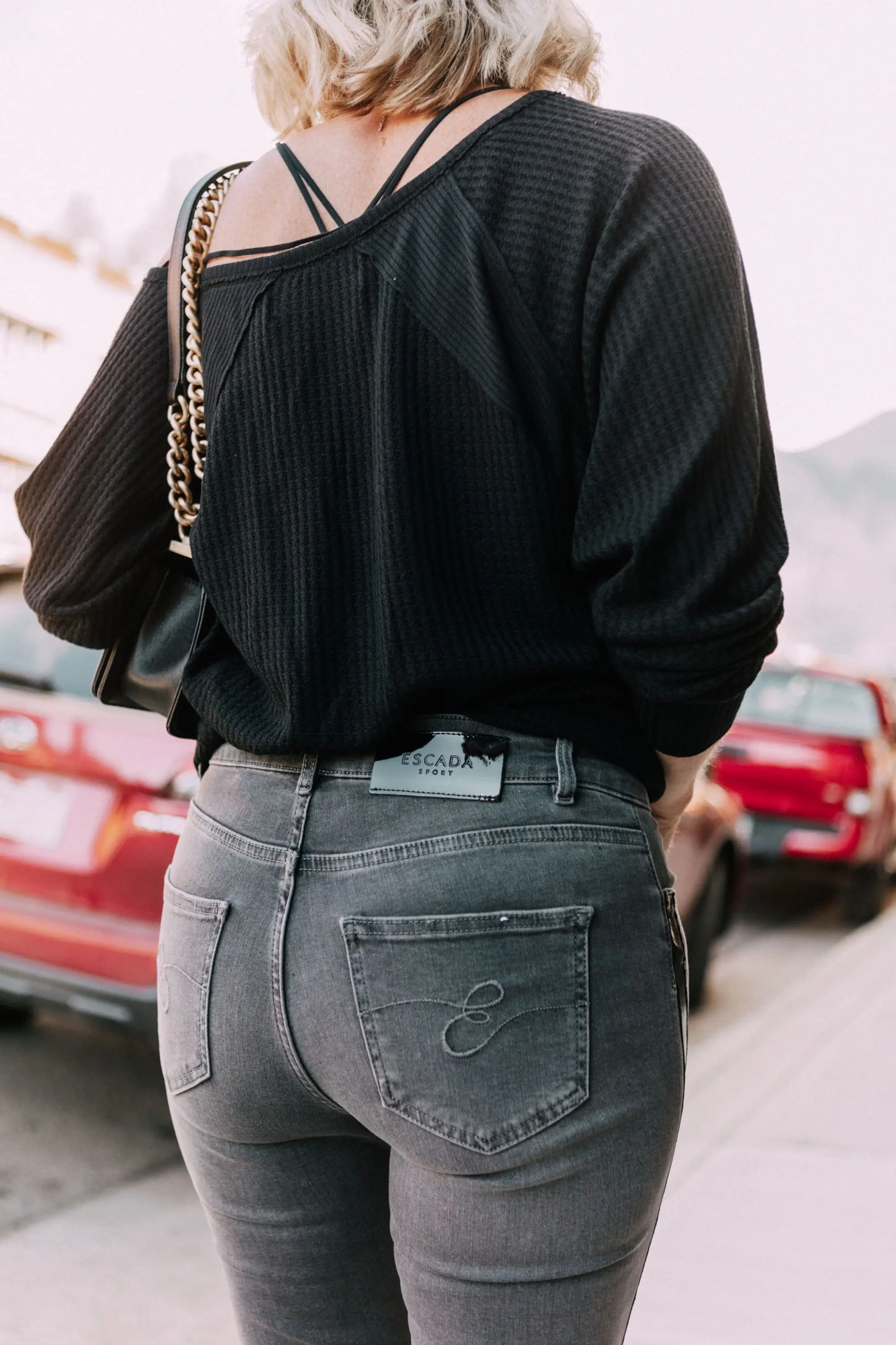 Striped Jeans, Fashion blogger Erin Busbee of BusbeeStyle.com wearing black patent striped jeans by Escada, waffle knit tee by Free People, bralette by Free People, heels by Schutz, and Chanel bag from Bloomingdale's in Telluride, CO