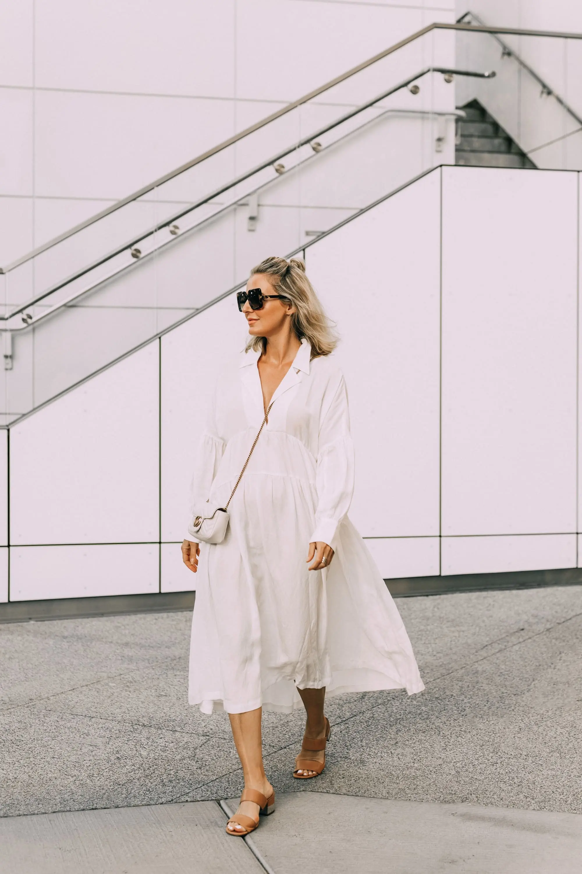 white billowy dress to hide stubborn belly fat by l'academie with gucci marmont leather crossbody handbag