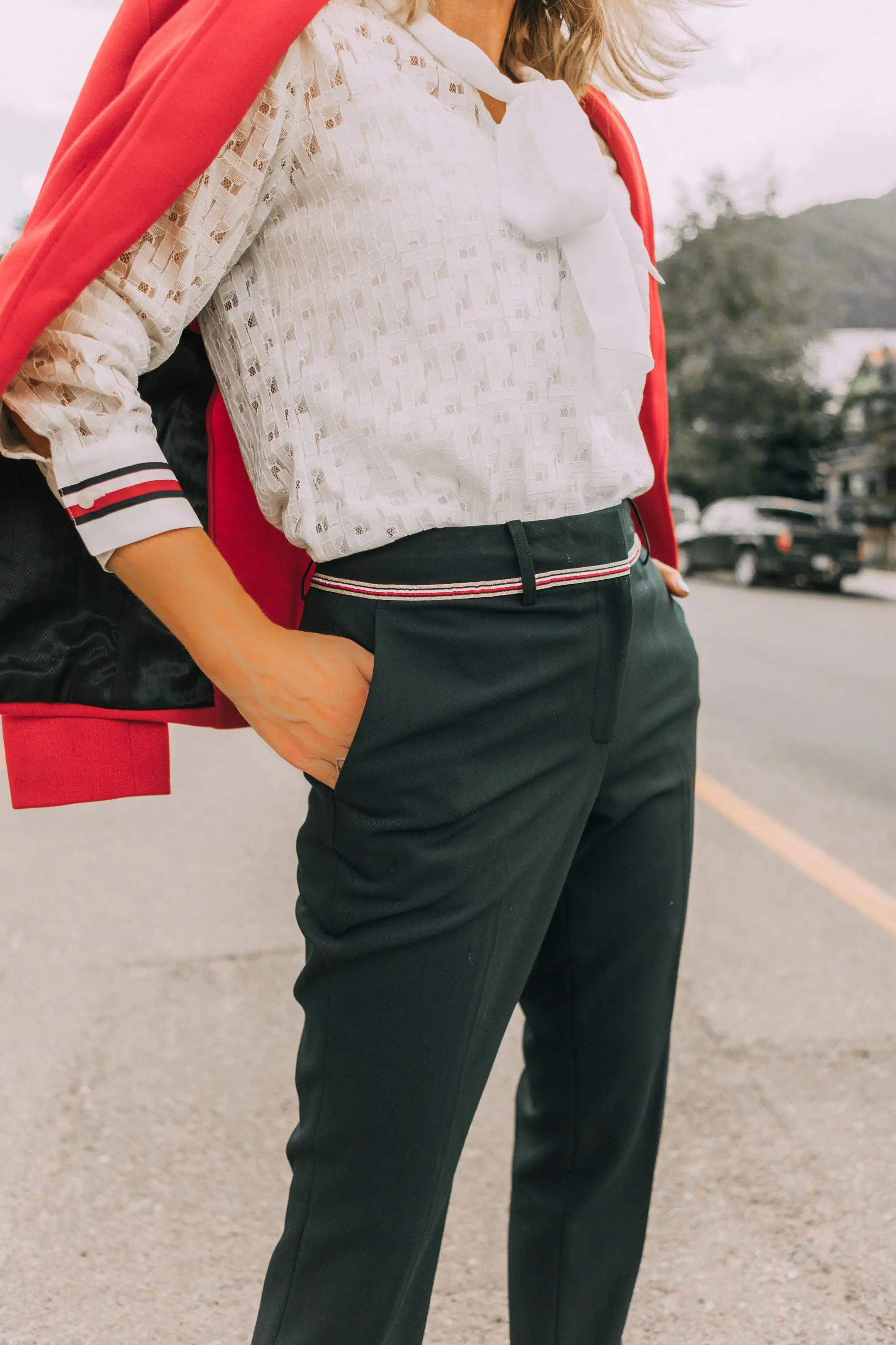 Colorful Office Outfits, Fashion blogger Erin Busbee of BusbeeStyle.com wearing a red knit blazer, navy pants, and white lace button down by Tommy Hilfiger in Telluride, CO