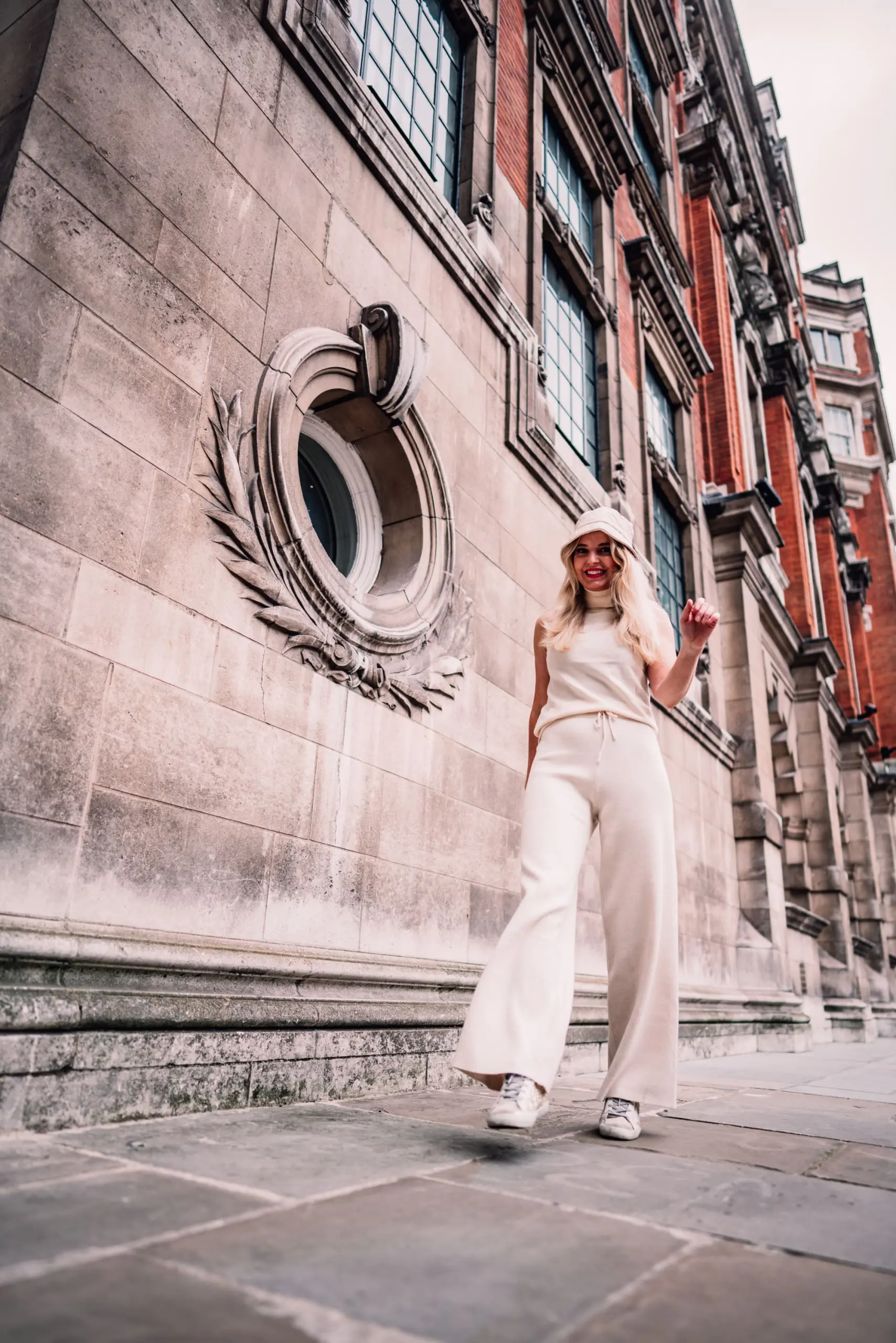 elegant loungewear, chic trench outfits, chic trench outfit, erin busbee, mango palazzo knit pants, mango sleeveless turtleneck sweater, london, england, how to wear a trench, casual trench outfit