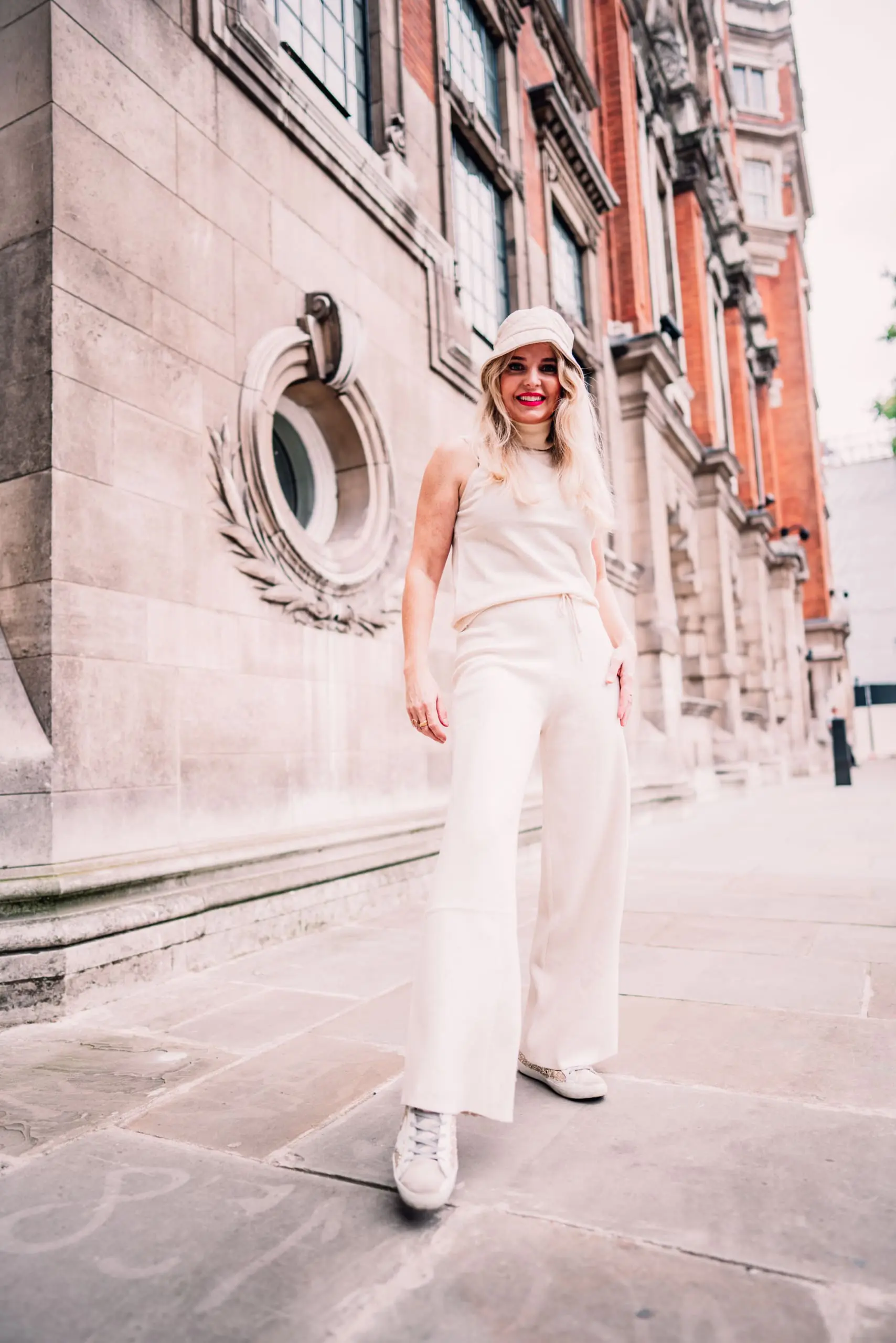 elegant loungewear, chic trench outfits, chic trench outfit, erin busbee, mango palazzo knit pants, mango sleeveless turtleneck sweater, london, england, how to wear a trench, casual trench outfit
