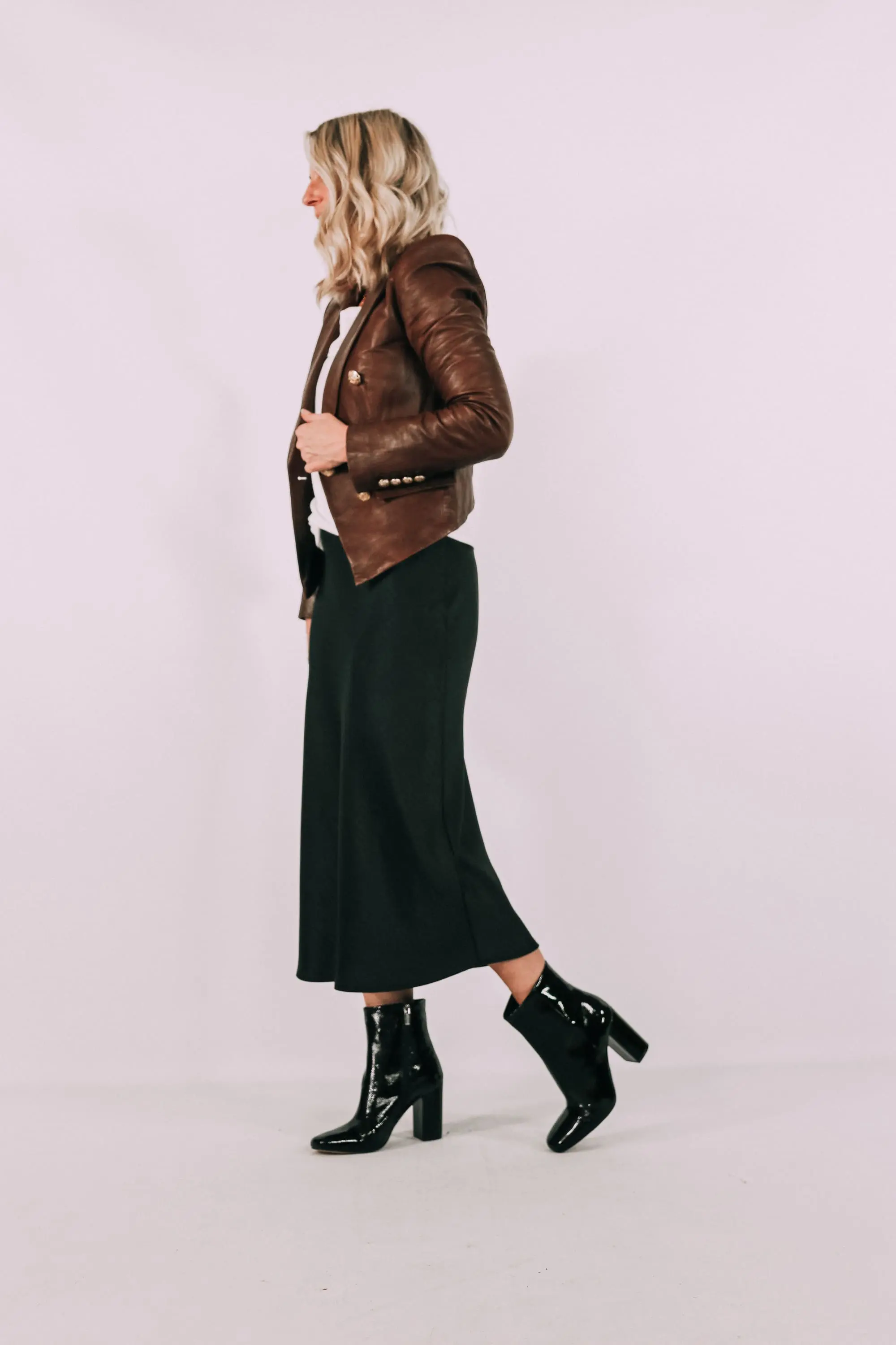 Square Toe Booties, Fashion blogger Erin Busbee of BusbeeStyle.com featuring black patent square toe booties by Vince Camuto with a satin black midi skirt in Telluride, CO