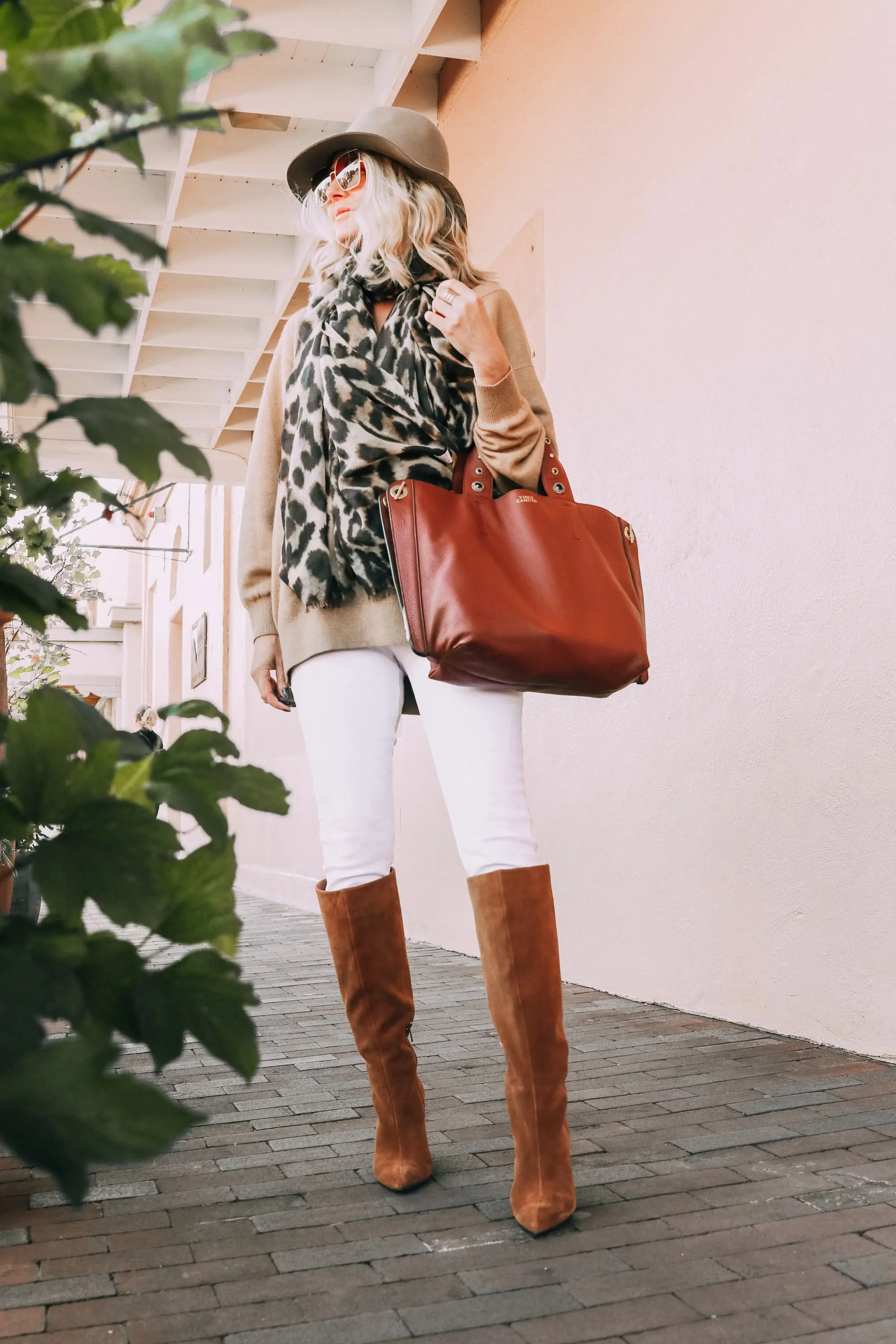brown suede knee boots vince camuto modesie cone-heel boot fall autumn outfit with white jeans