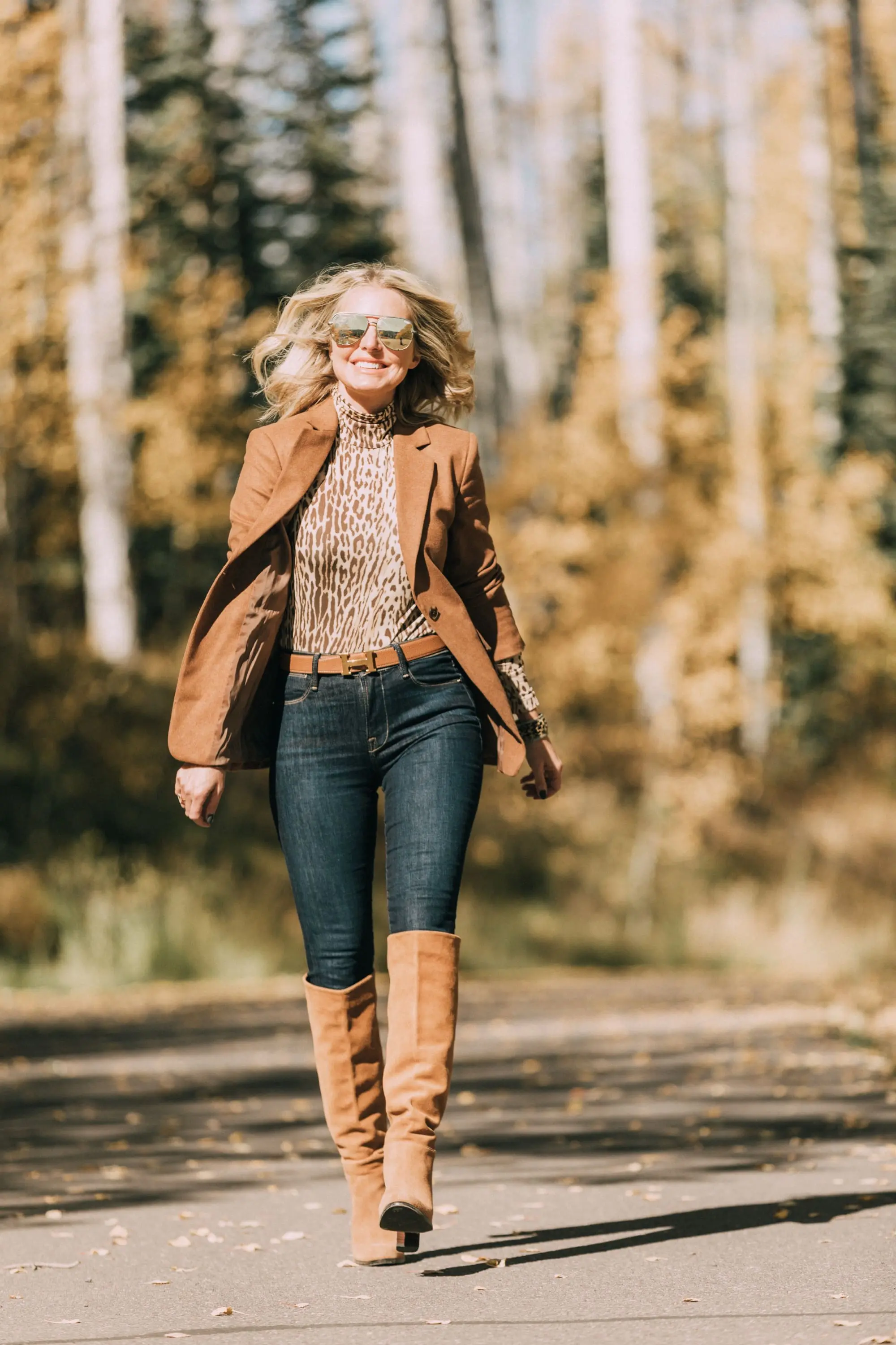 fashion blogger erin busbee wearing camel brown blazer over zimmerman leopard print turtleneck skinny jeans paired with sam edelman knee high suede boots