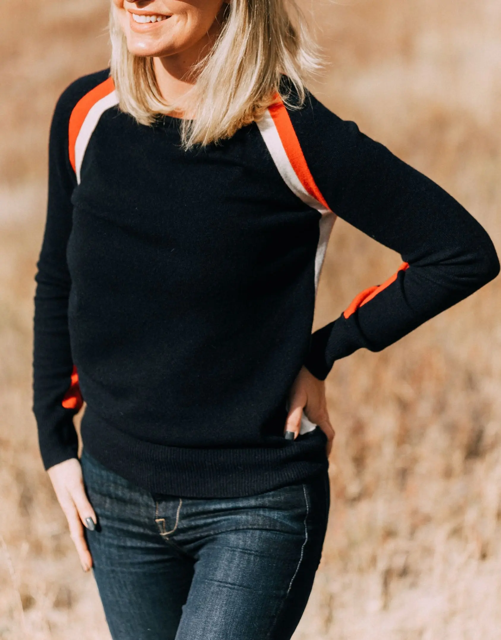 madeleine thompson anastasia cashmere crewneck tan red stripe sweater outfit