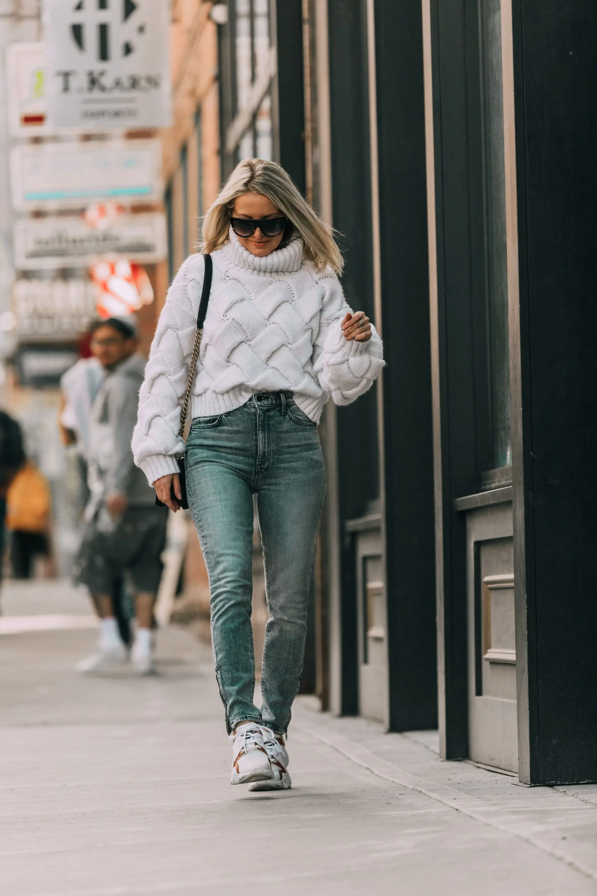 how to style dad sneaker trend outfit with designer givenchy ugly dad sneaker shoes with blue jeans white chunky sweater