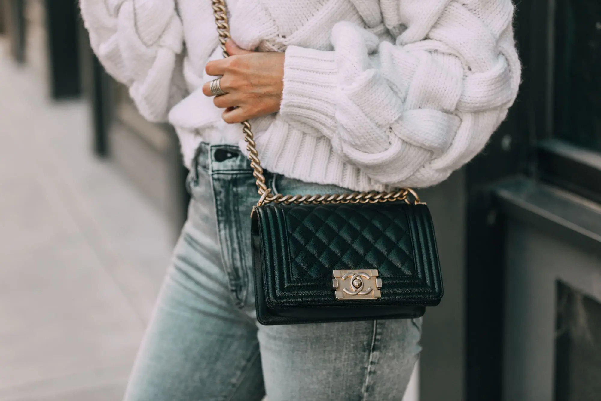 Fall Designer Handbags, Fashion blogger Busbee Style carrying Chanel boy bag wearing jeans and sweater in Telluride, CO