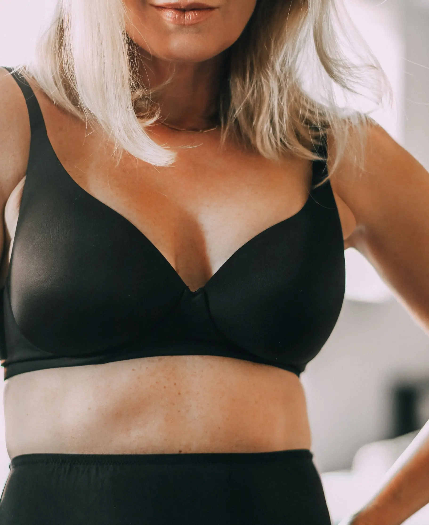 Best Slips, Fashion blogger Erin Busbee of BusbeeStyle.com wearing a black skirt slip and camisole and t-shirt bra from Jockey in Telluride, CO