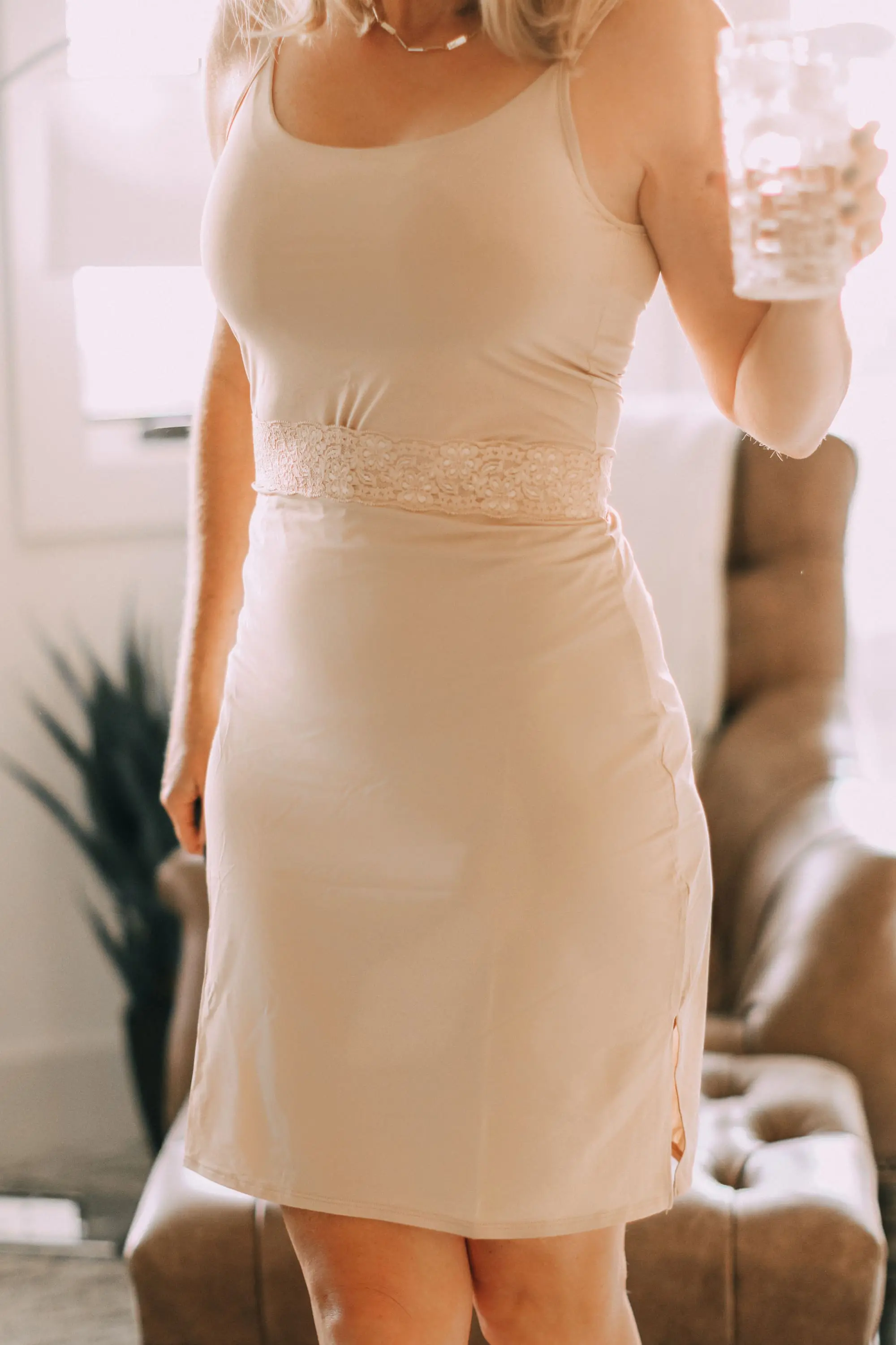 Busbee Style wearing best nude color half dress slip undergarment lingerie with adjustable straps