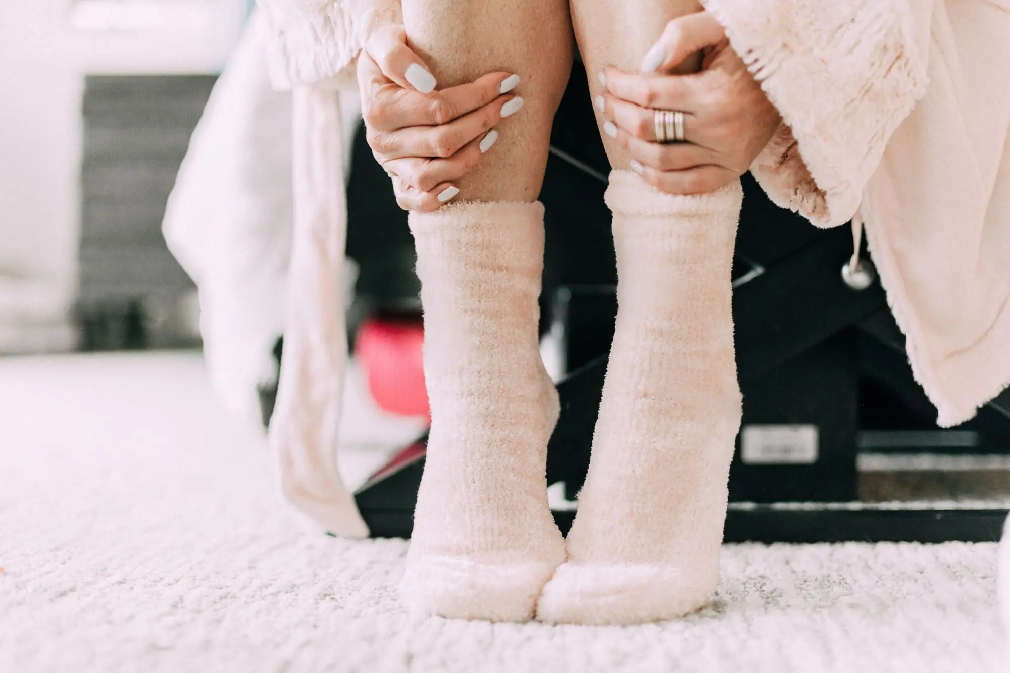Loungewear Gifts, Fashion blogger Erin Busbee of BusbeeStyle.com wearing stripe tree pajama shorts, pink satin trip camisole, luxe sparkle robe, chenille slippers, fuzzy socks, and Cool Nights eye mask from Soma in Telluride, CO