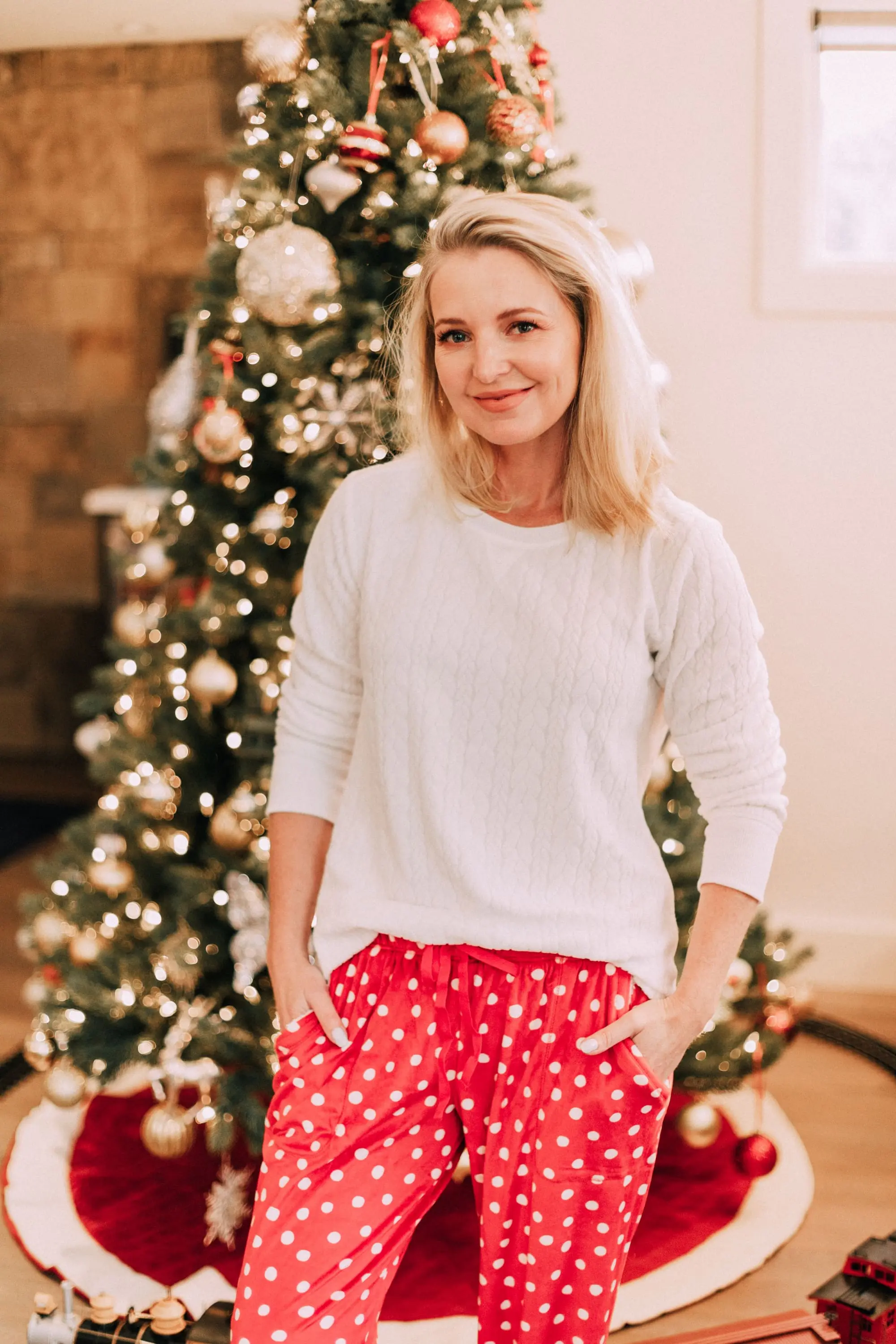Holiday Traditions, Fashion blogger Erin Busbee of BusbeeStyle.com wearing red fleece polka dot pajama pants with a fleece cable knit pullover from Jockey in Telluride, CO
