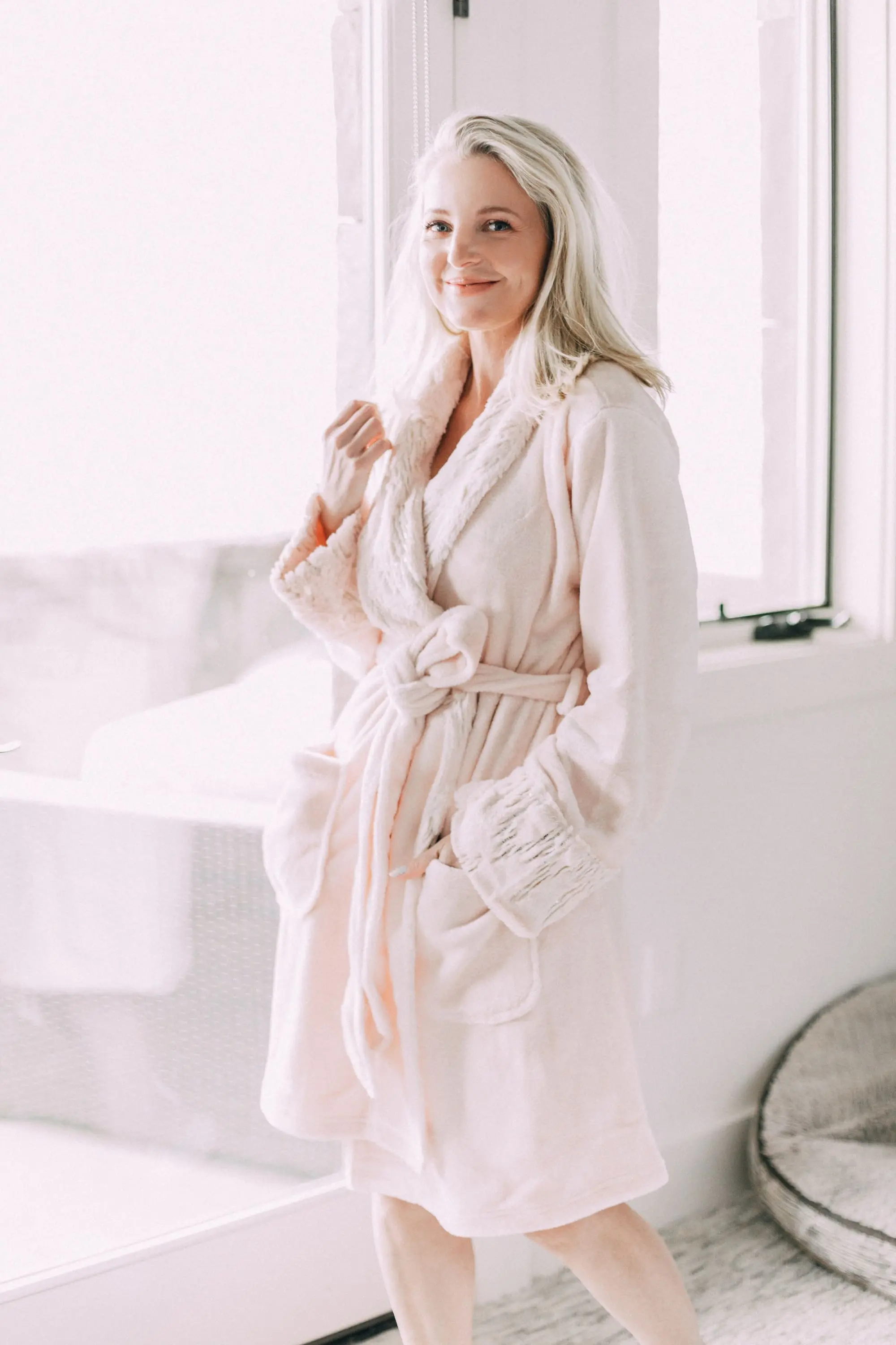 Loungewear Gifts, Fashion blogger Erin Busbee of BusbeeStyle.com wearing stripe tree pajama shorts, pink satin trip camisole, luxe sparkle robe, chenille slippers, fuzzy socks, and Cool Nights eye mask from Soma in Telluride, CO