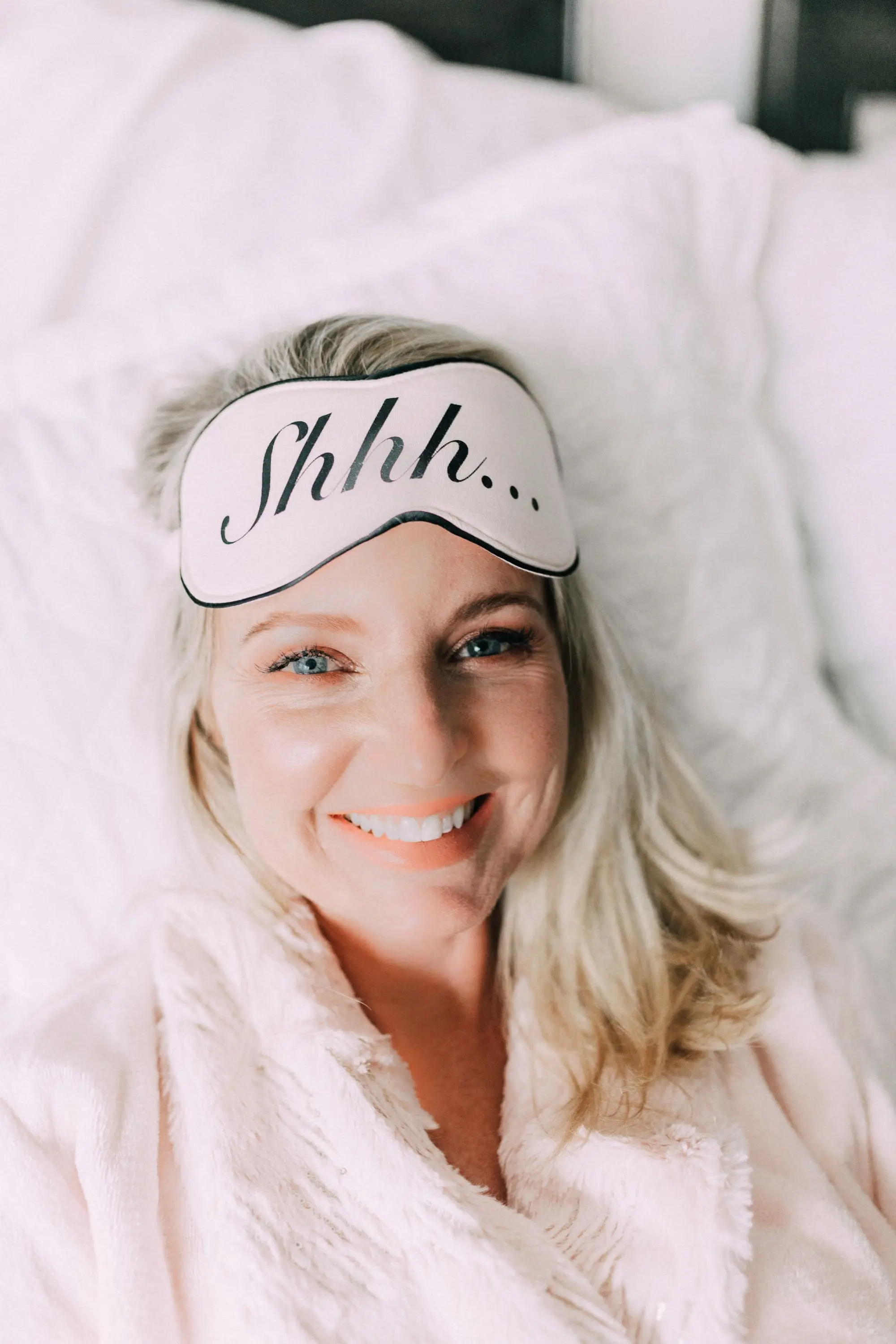 Loungewear Gifts, Fashion blogger Erin Busbee of BusbeeStyle.com wearing stripe tree pajama shorts, pink satin trip camisole, luxe sparkle robe, chenille slippers, fuzzy socks, and Cool Nights eye mask from Soma in Telluride, CO