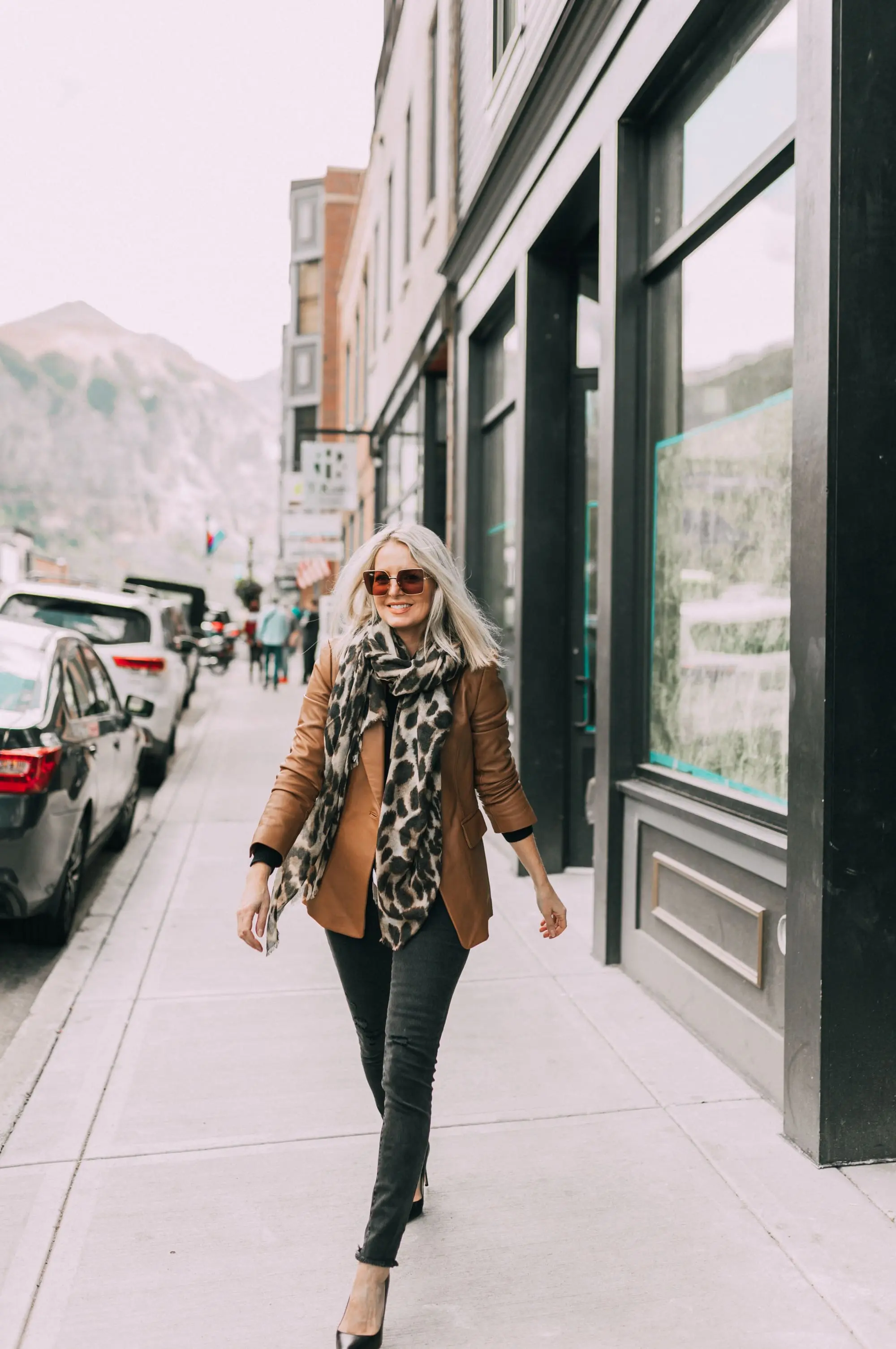 November Favorites, Fashion blogger Erin Busbee of BusbeeStyle.com wearing black skinny jeans, camel leather blazer, black sweater, black pumps, and leopard print scarf from Bloomingdale's in Telluride, CO