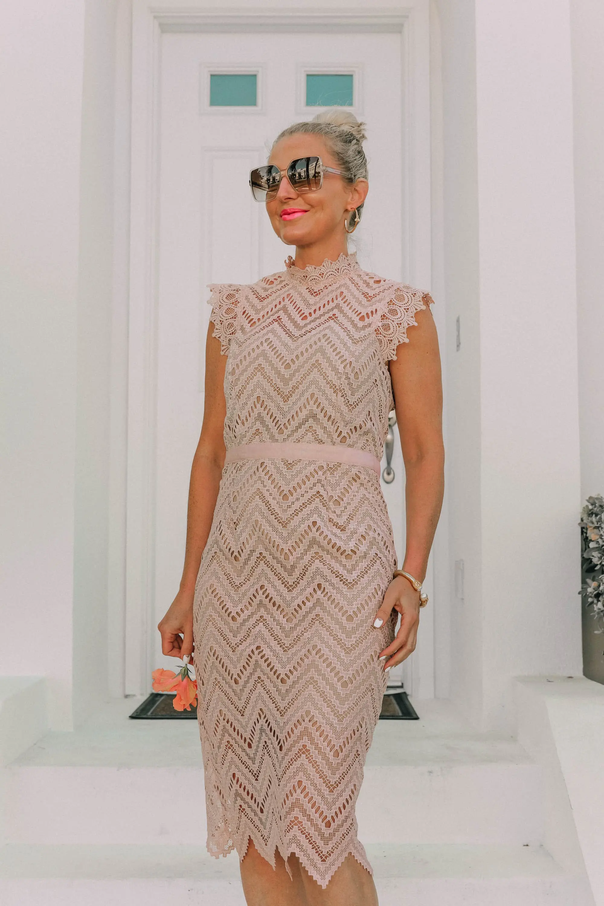 Mother's Day Dresses, Fashion blogger Erin Busbee of BusbeeStyle.com wearing a pink blush lace Bardot dress in the Bahamas styled with nude Valentino rockstud sandals and gold jewelry from Nordstrom