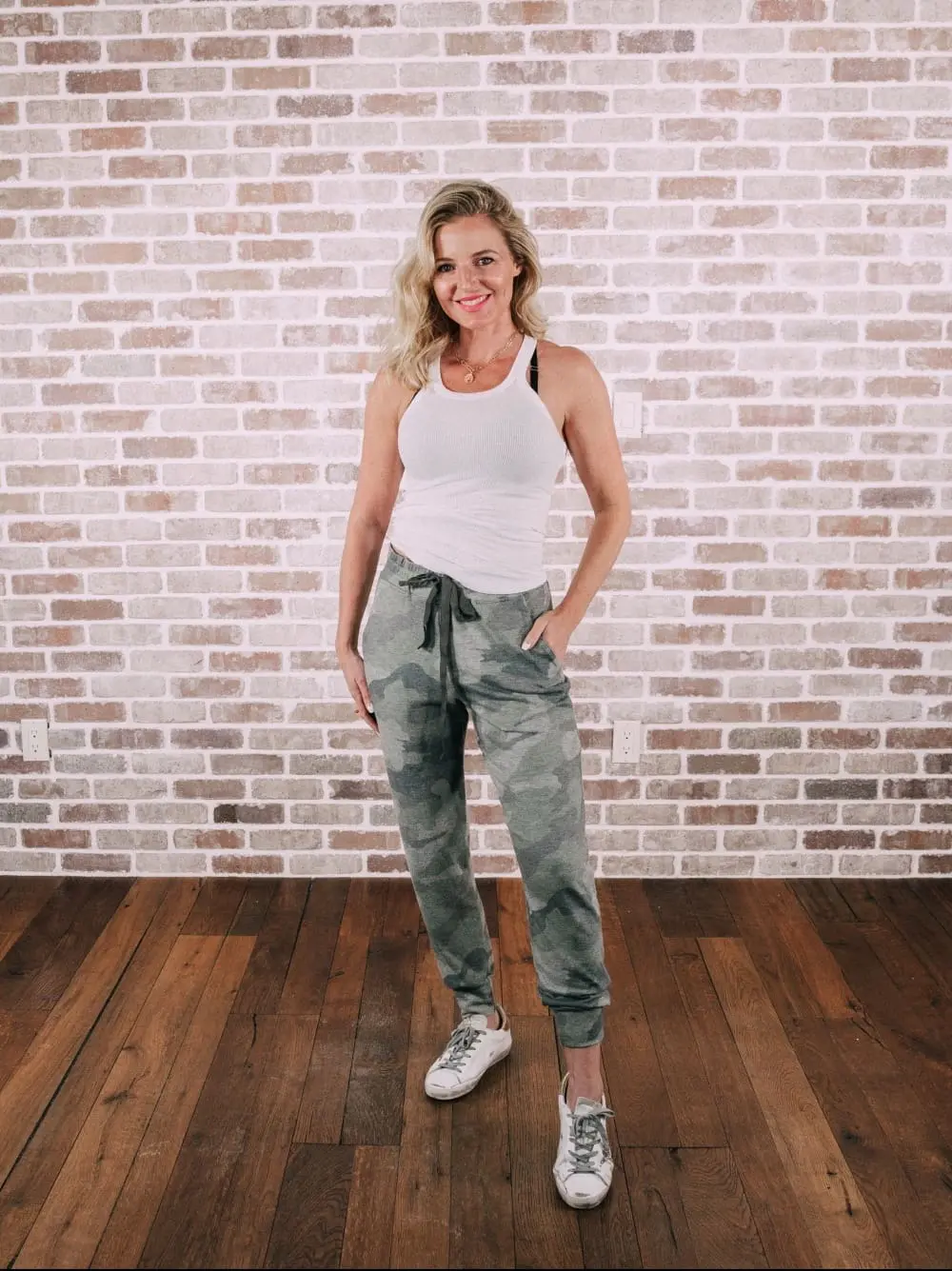Loungewear Outfits, Fashion blogger Erin Busbee of BusbeeStyle.com sharing her favorite loungewear including a white tank and camo joggers by Sundry in Telluride, Colorado, stylish lazy day outfits