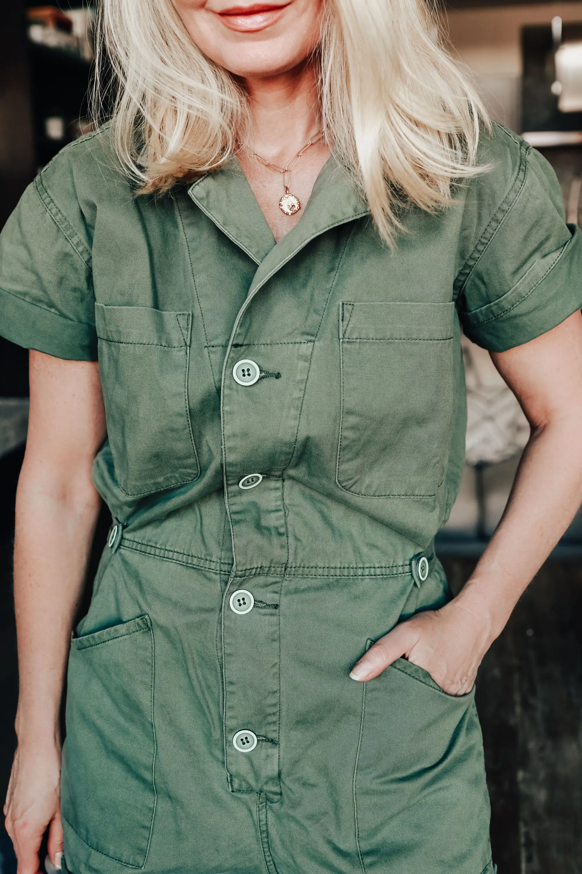 Africa Outfits, Erin Busbee of Busbee Style wearing a green romper by Pistola with wedge sandals by Linea Paolo in Telluride, Colorado