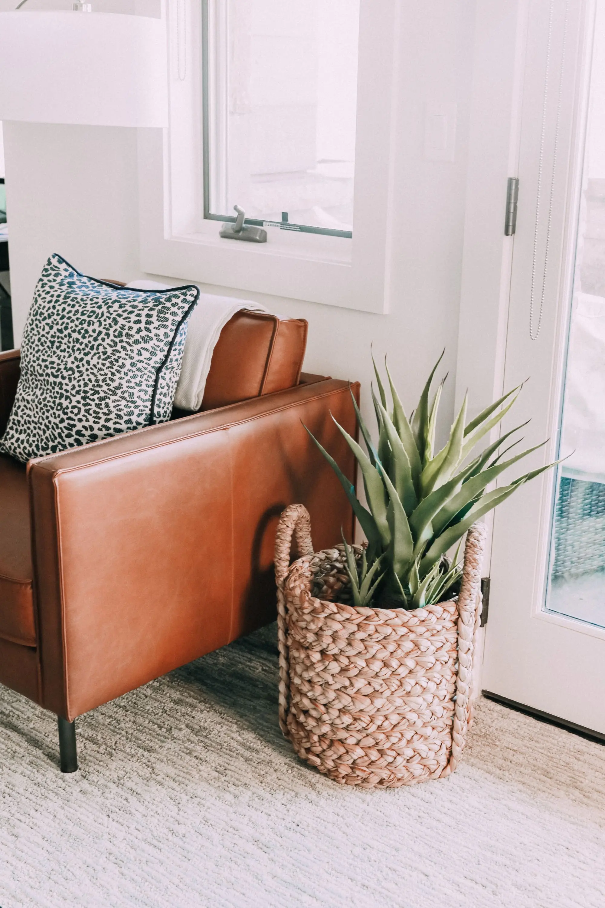 best artificial indoor plants, real-looking faux succulent in woven basket, faux indoor greenery