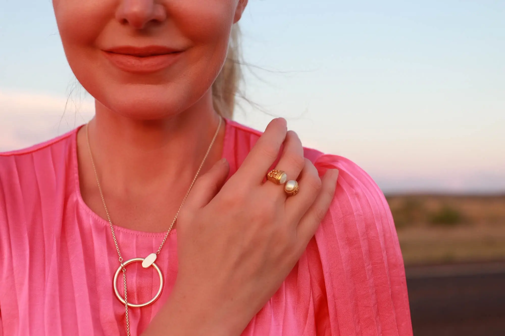 gold Julie Vos mother of pearl Paris Luxe fashion jewelry cocktail ring worn with Kendra Scott gold lariat slider necklace