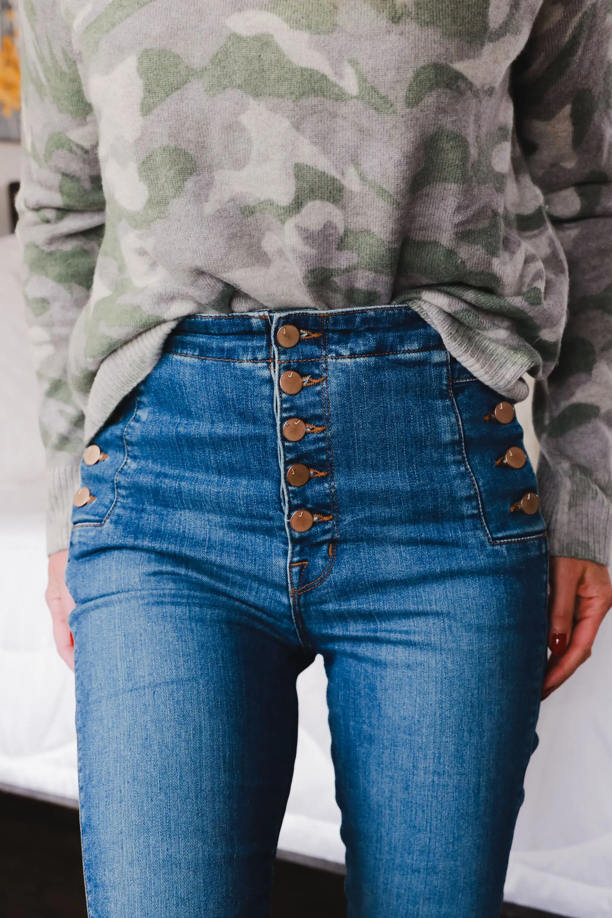 Aqua green camouflage women's crewneck long sleeve cashmere sweater with J Brand Natasha skinny button fly blue jeans