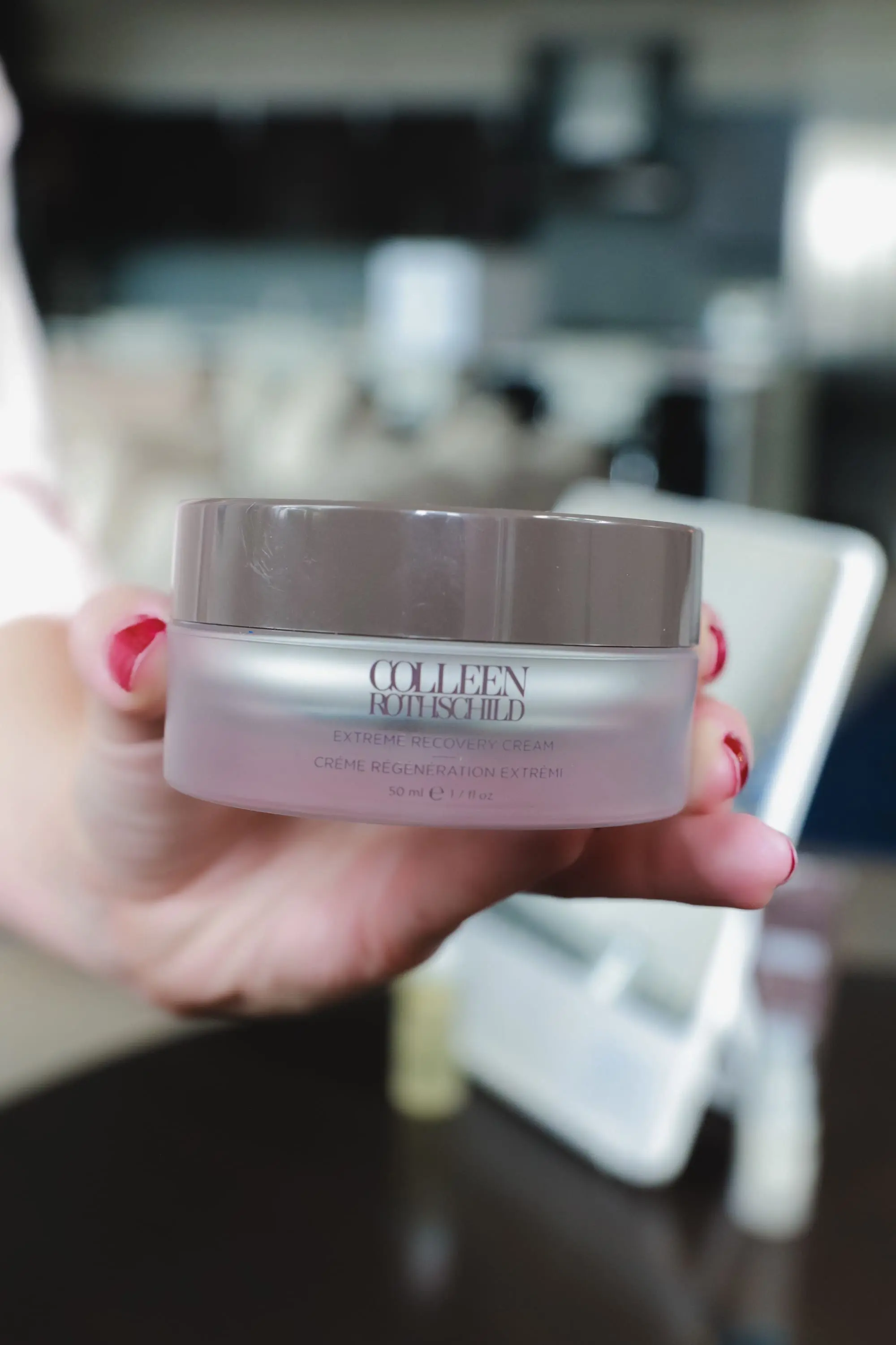 Favorite Skincare Brand, Erin Busbee of Busbee Style holding the Colleen Rothschild Extreme Recovery Cream in her home in Telluride, Colorado