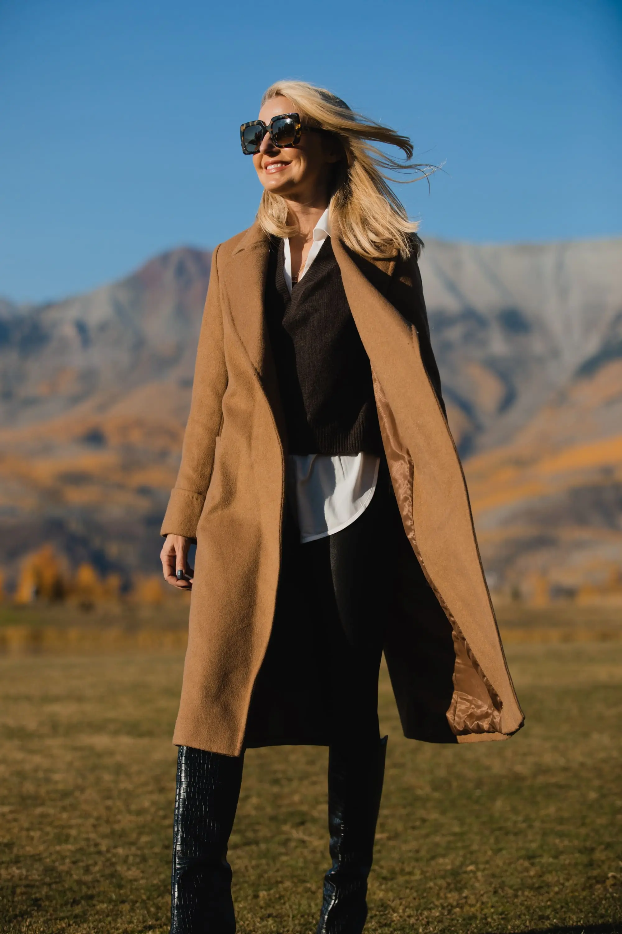 Perfect Camel Coat, Erin Busbee of Busbee Style wearing a Ralph Lauren camel wool wrap coat over a brown brochu walker layered sweater, spanc faux leather leggings, and shutz black croc embossed leggings in Telluride, Colorado