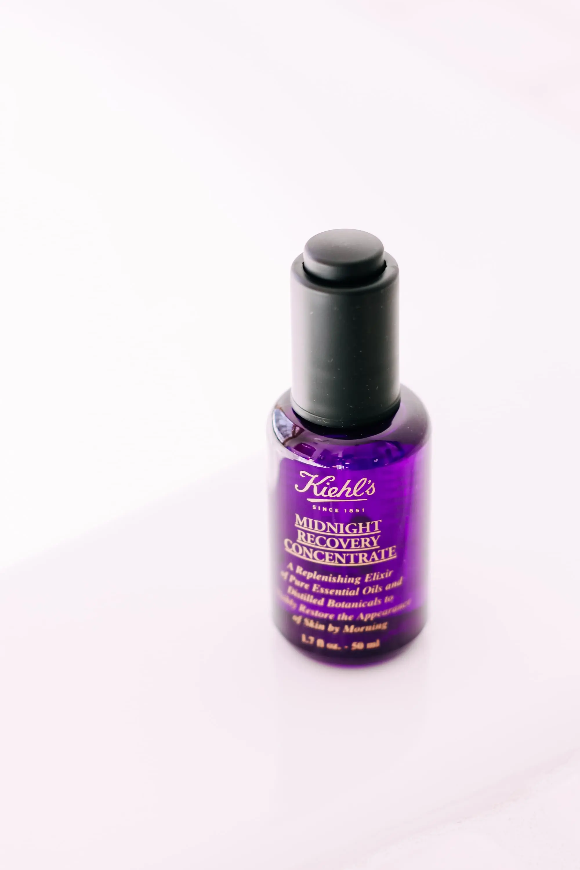 Skincare Gifts, Erin Busbee of Busbee Style using the Midnight Recovery Concentrate Face Oil by Kiehl' in Telluride, Colorado