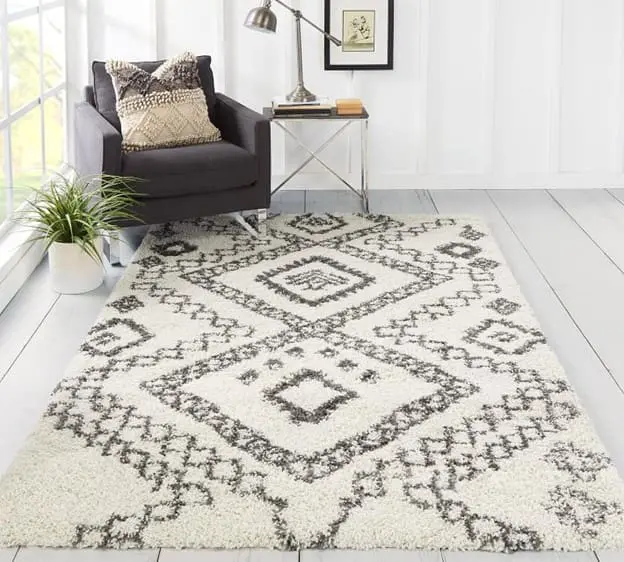 How To Choose The Perfect Rug For Your Space featuring neutral rug with lots of texture