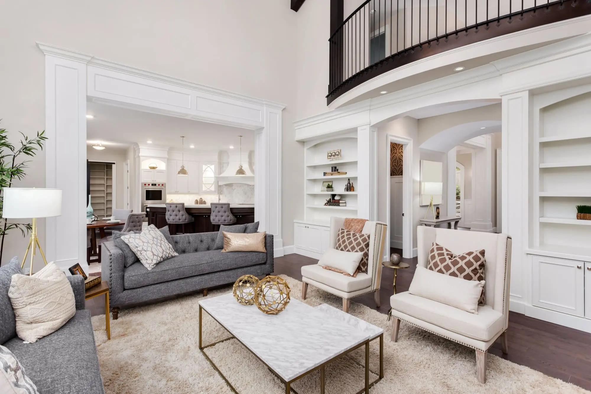 How To Choose The Perfect Rug For Your Space showcasing Neutral room with rug placed partially under legs of furniture
