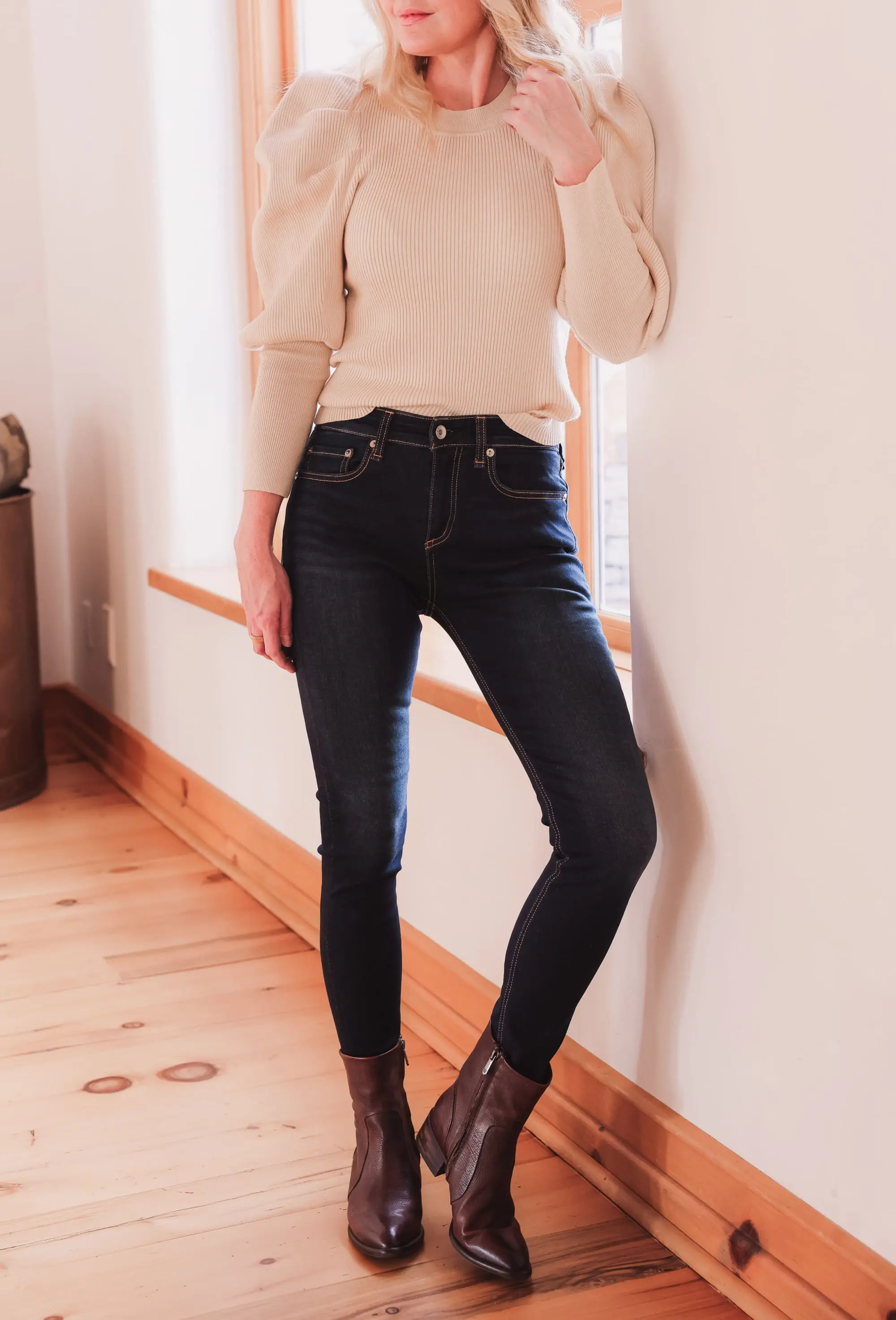 Best brown booties, Erin Busbee of Busbee wearing an ASTR the Label sculptural sleeve sweater with rag & bone skinny jeans and brown sam edelman hilary booties from Nordstrom in Telluride, Colorado
