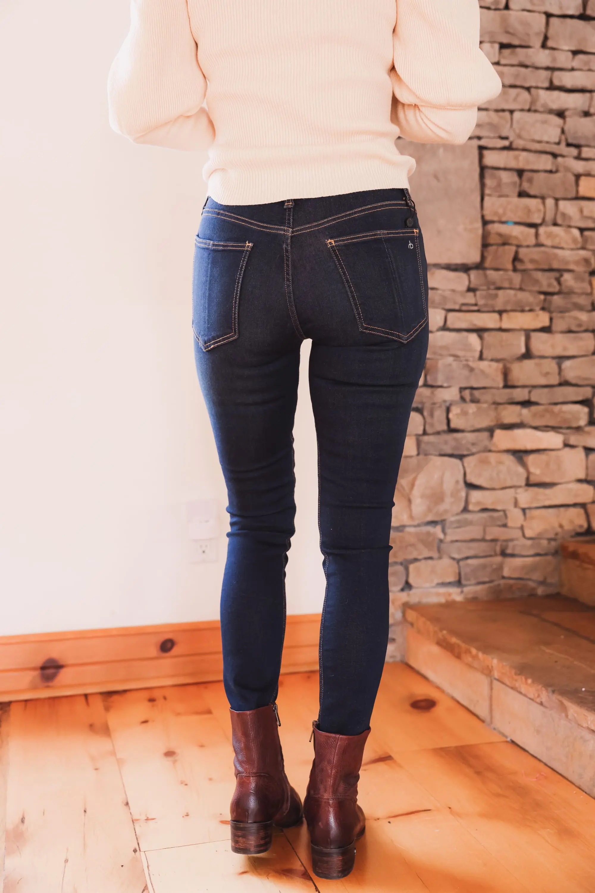 Best brown booties, Erin Busbee of Busbee wearing an ASTR the Label sculptural sleeve sweater with rag & bone skinny jeans and brown sam edelman hilary booties from Nordstrom in Telluride, Colorado