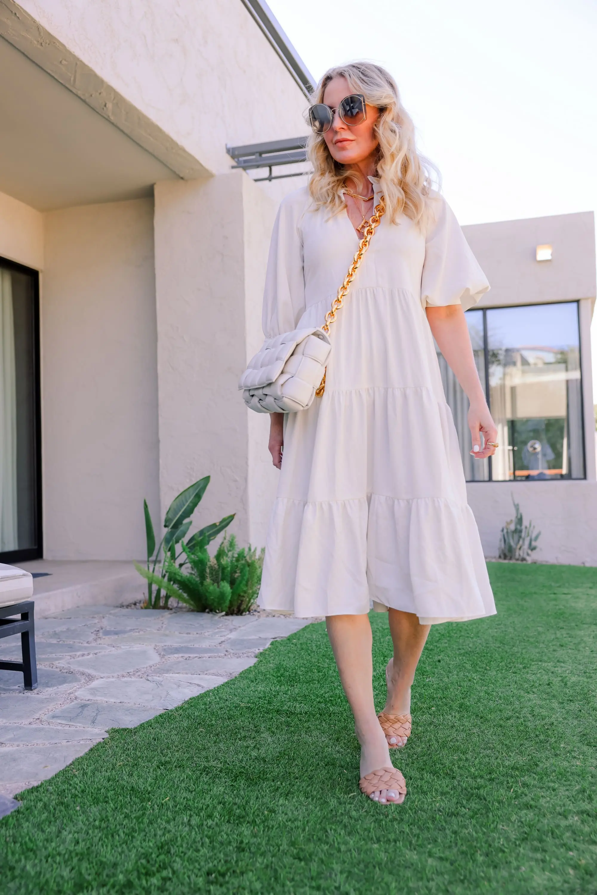 spring shoes, shoe trends spring 2021, best spring shoes, spring shoe styles, shoes for spring, summer shoes, summer sandals, summer shoes list, erin busbee, express tan quilted sandals, white bottega veneta cassette bag, amanda uprichard white midi dress