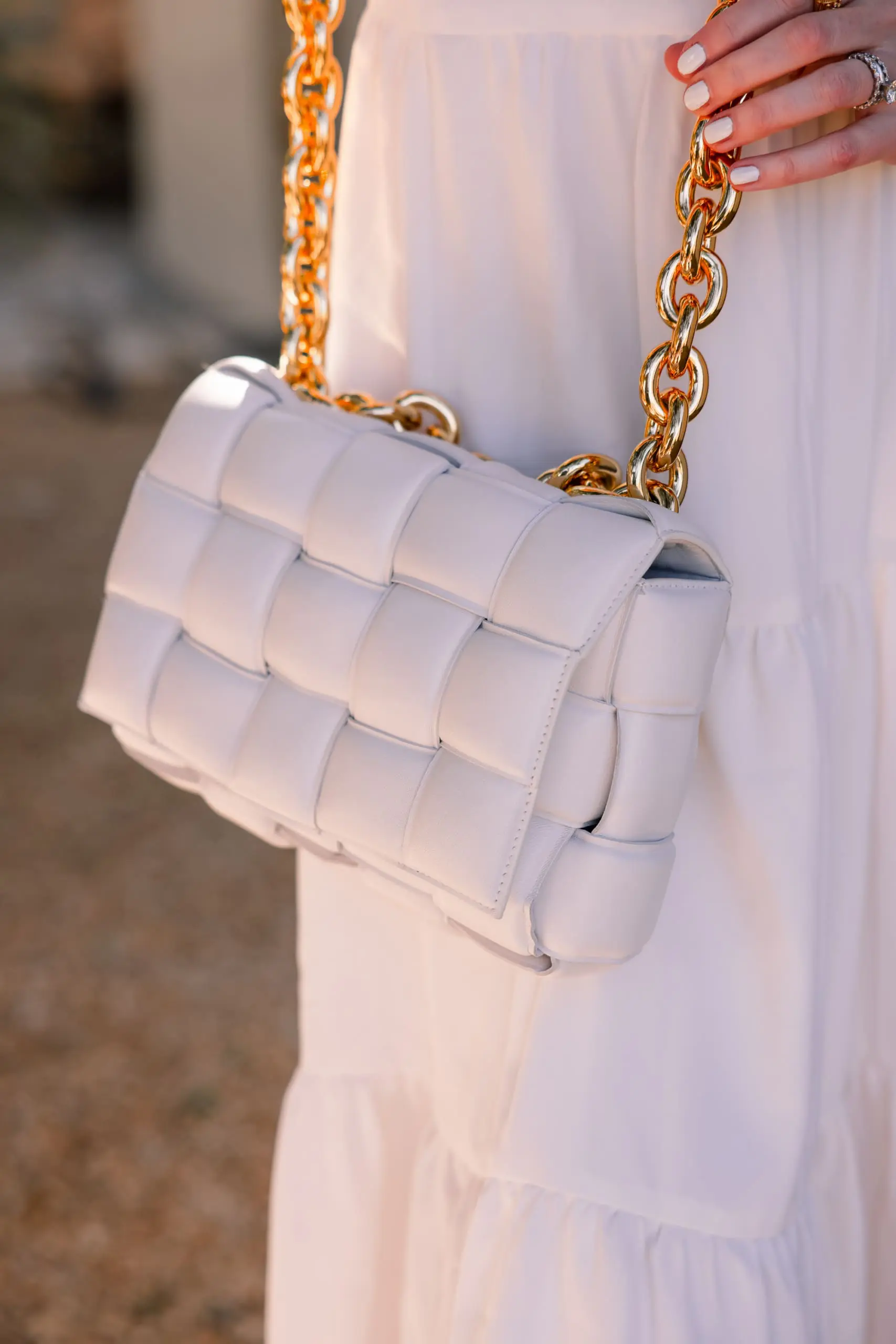 Honest review of Bottega Veneta Cassette Bag in White on fashion blogger over 40 Erin Busbee
