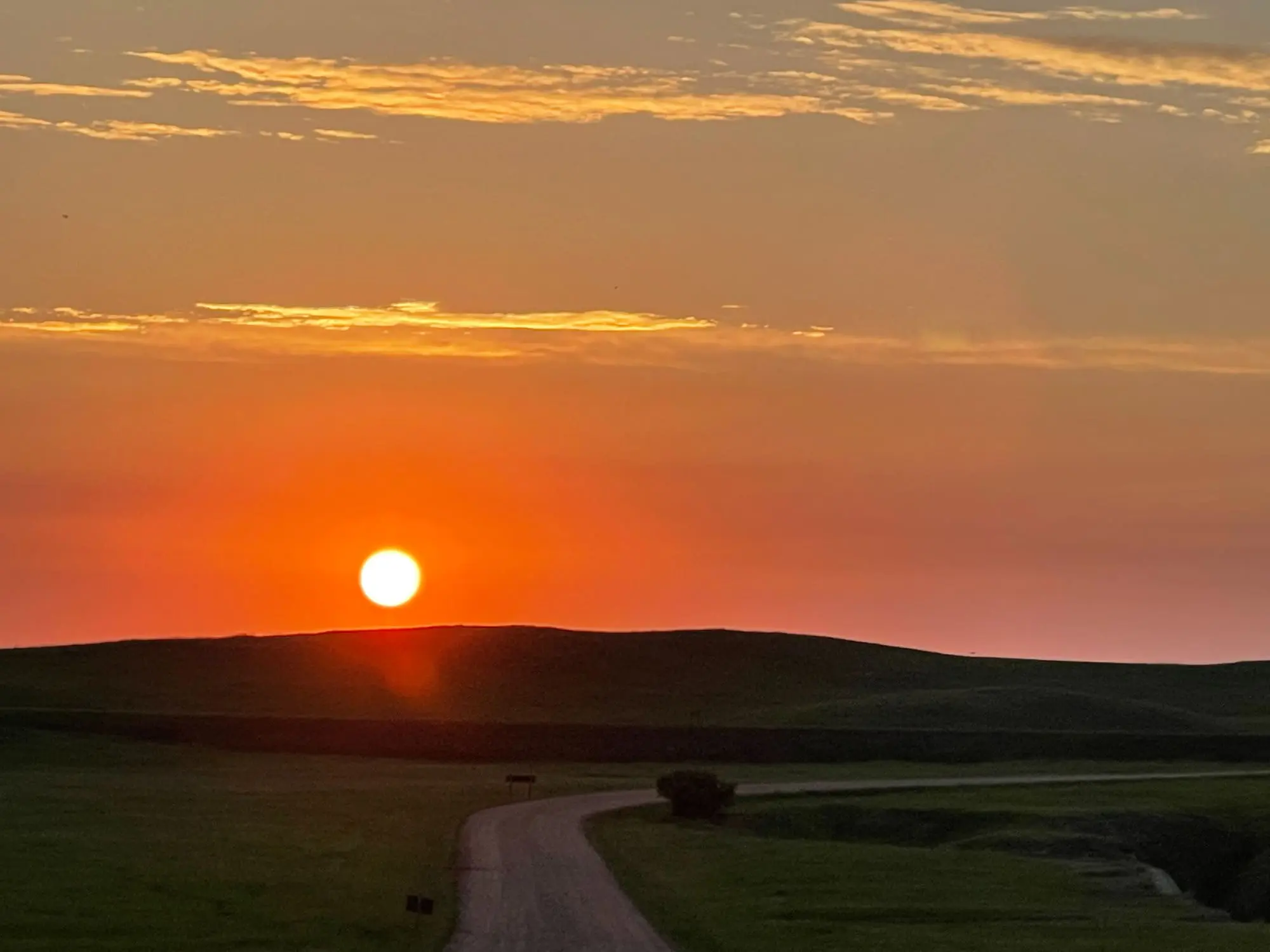 where to stop on a cross-country road trip, best places to stop on a cross country road trip, cross country road trip, west coast to east coast road trip, erin busbee, traveling with kids, how to travel with kids, how to travel with a dog, cross country road trip with kids, badlands national park, south dakota, cross country busbee style, family road trip