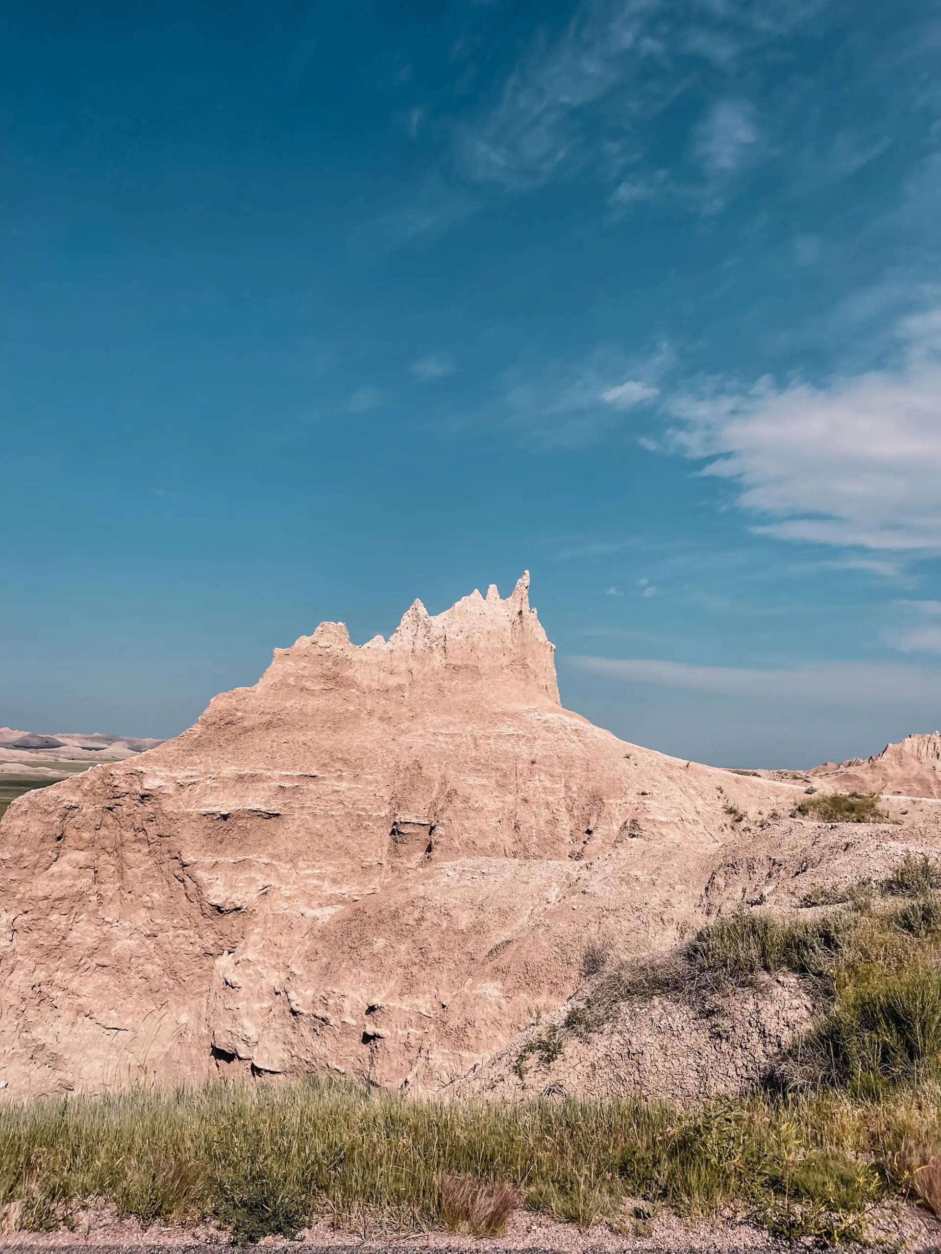 where to stop on a cross-country road trip, best places to stop on a cross country road trip, cross country road trip, west coast to east coast road trip, erin busbee, traveling with kids, how to travel with kids, how to travel with a dog, cross country road trip with kids, badlands national park, south dakota, cross country busbee style, family road trip