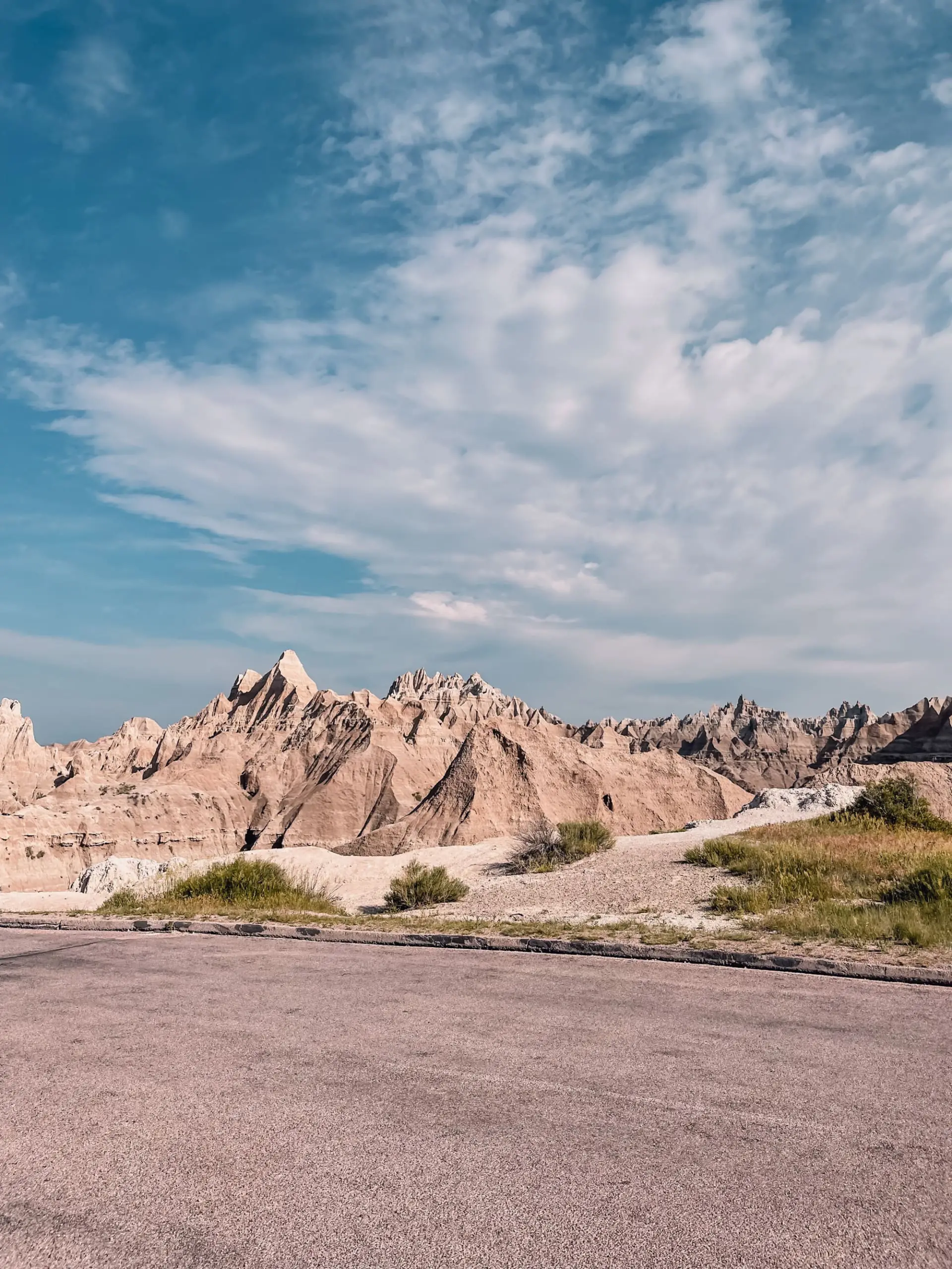 where to stop on a cross-country road trip, best places to stop on a cross country road trip, cross country road trip, west coast to east coast road trip, erin busbee, traveling with kids, how to travel with kids, how to travel with a dog, cross country road trip with kids, badlands national park, south dakota, cross country busbee style, family road trip