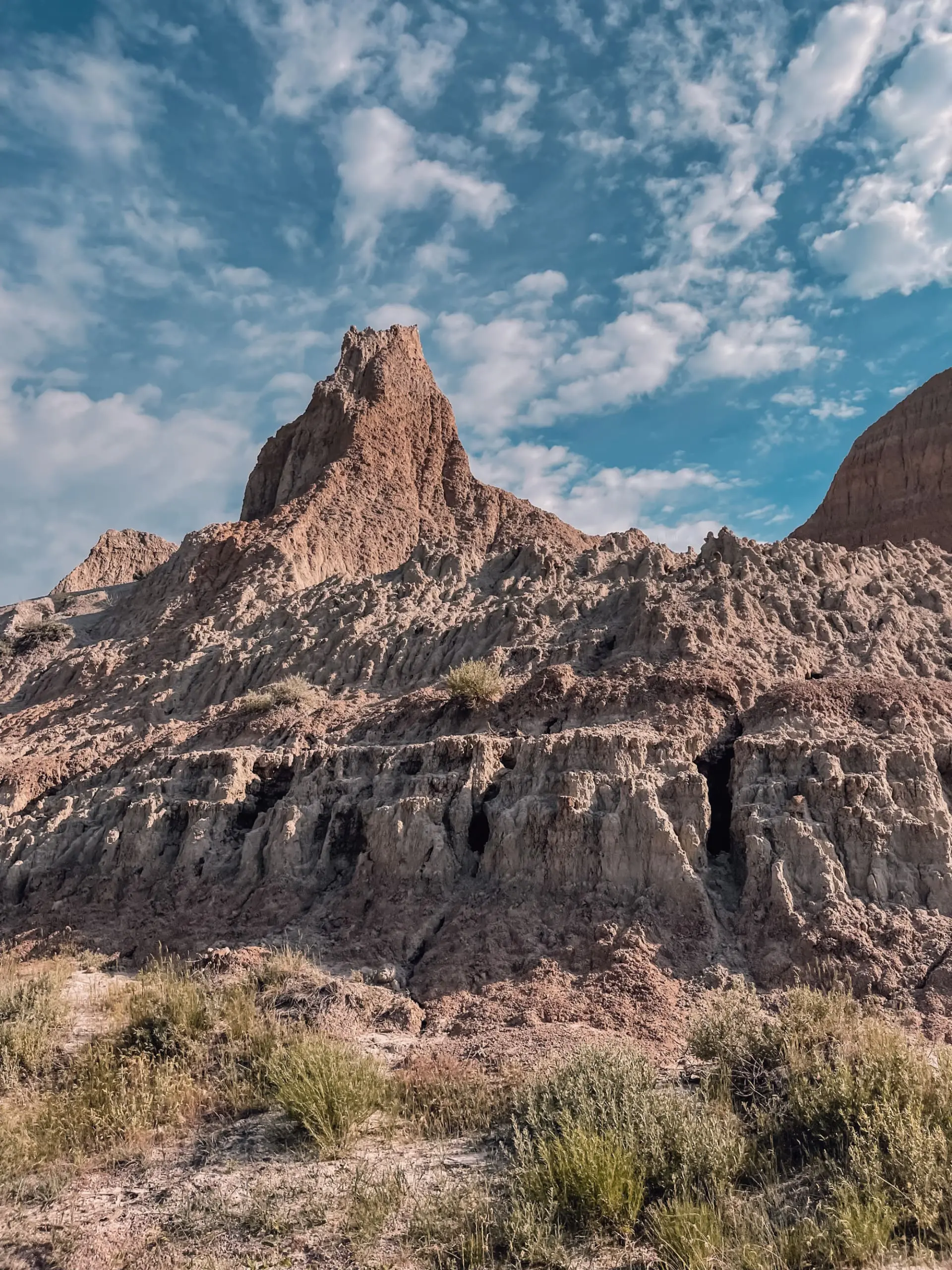 where to stop on a cross-country road trip, best places to stop on a cross country road trip, cross country road trip, west coast to east coast road trip, erin busbee, traveling with kids, how to travel with kids, how to travel with a dog, cross country road trip with kids, badlands national park, south dakota, cross country busbee style, family road trip