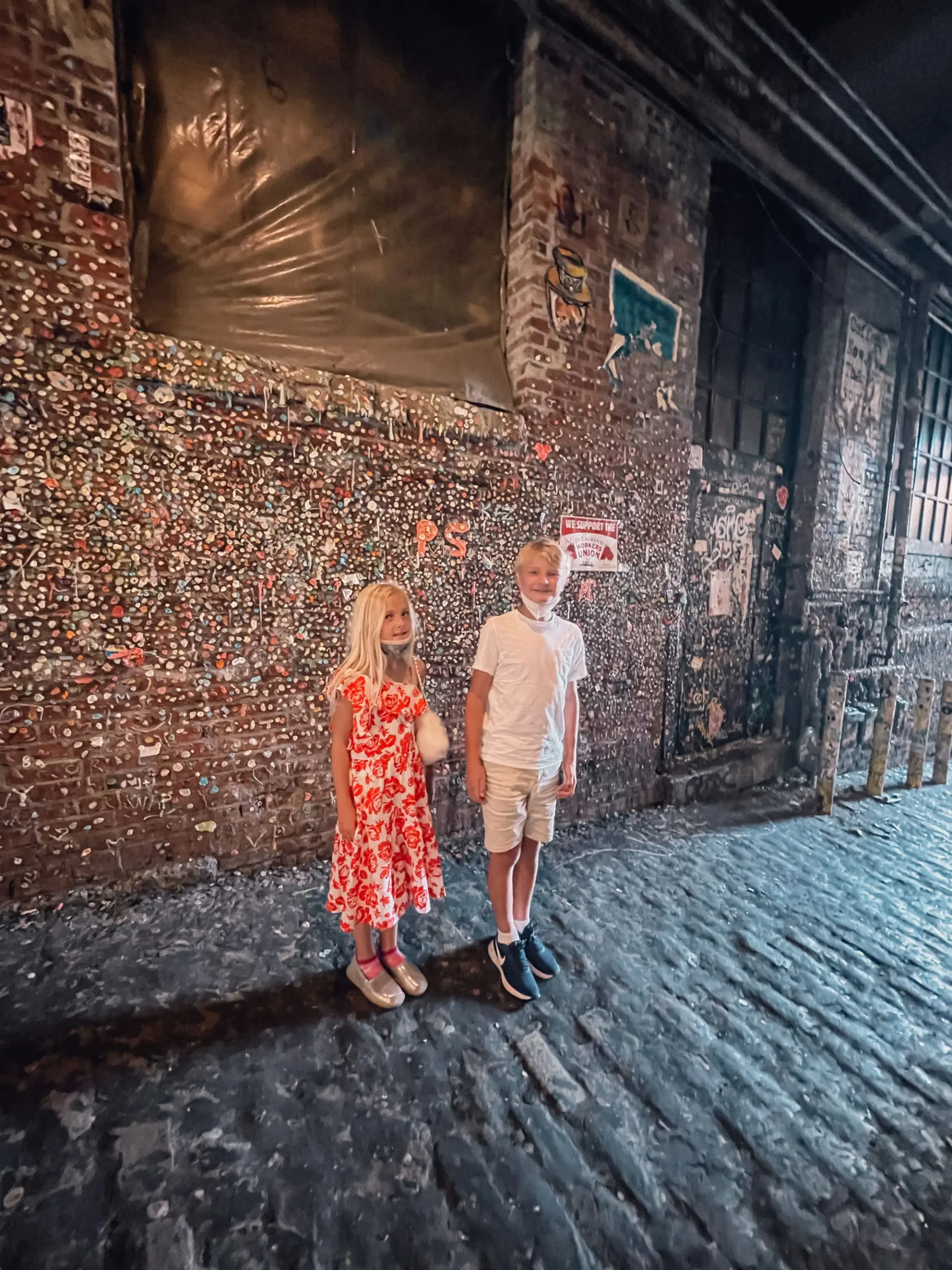 where to stop on a cross-country road trip, best places to stop on a cross country road trip, cross country road trip, west coast to east coast road trip, erin busbee, traveling with kids, how to travel with kids, how to travel with a dog, cross country road trip with kids, seattle, washington, pike place market, seattle gum wall