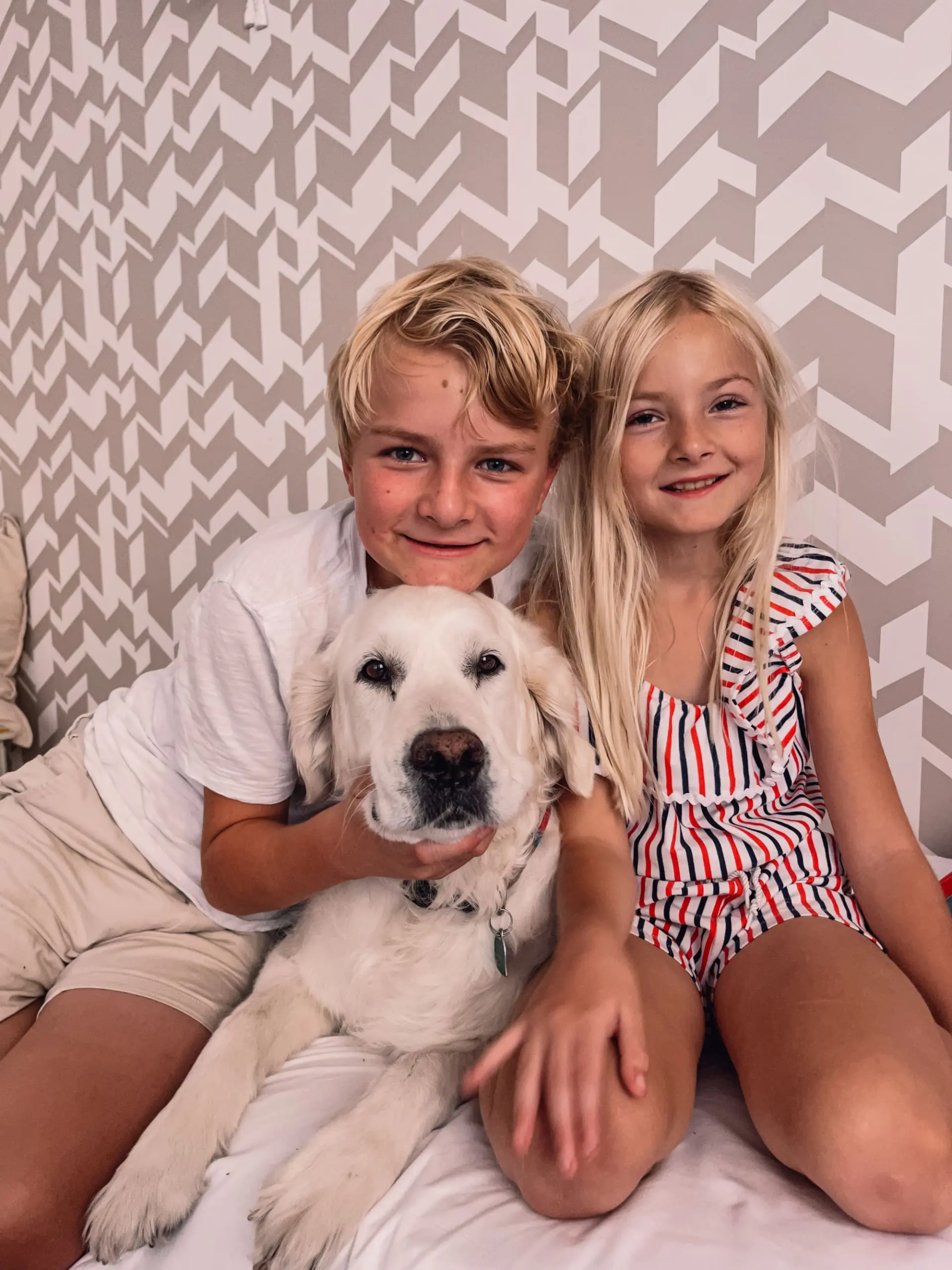 kids with golden retriever