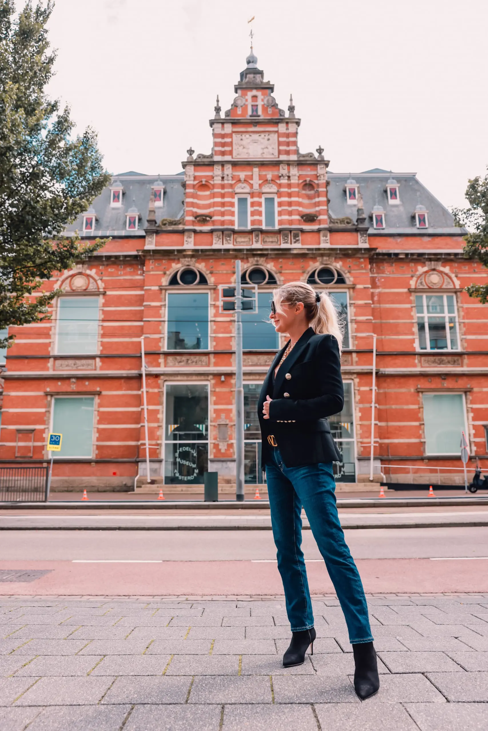 casual date night outfit, what to wear date night, how to dress for date night, date night look, casual date night, easy date night outfit, erin bsubee, balmain blazer, ag ex-boyfriend jeans, schutz black bette booties, valentino belt, lulu notch neck bodysuit, amsterdam, netherlands