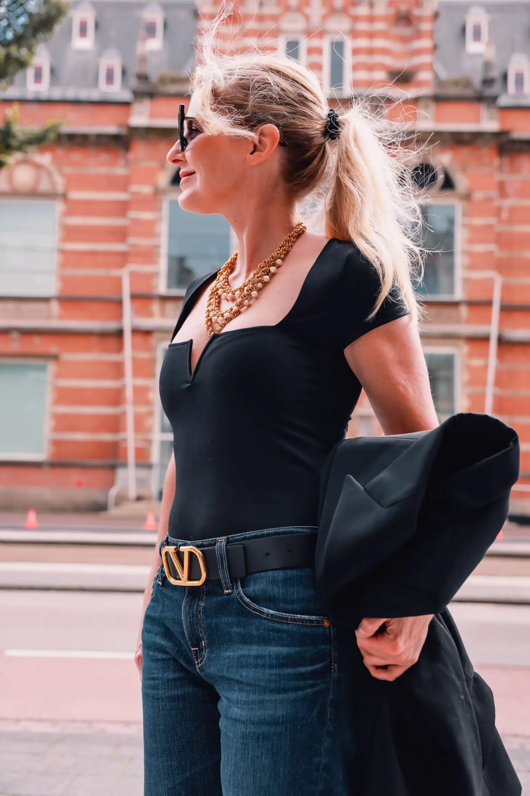 casual date night outfit, what to wear date night, how to dress for date night, date night look, casual date night, easy date night outfit, erin bsubee, balmain blazer, ag ex-boyfriend jeans, schutz black bette booties, valentino belt, lulu notch neck bodysuit, amsterdam, netherlands