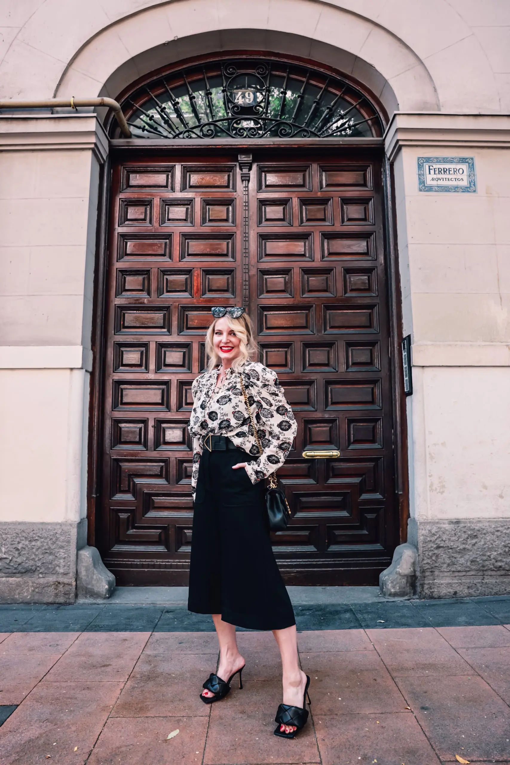 how to wear culottes, why wear culottes, how to style culottes, wear culottes, style culottes, how to wear culottes over 40, styling culottes over 40, erin busbee, see by chloe culottes, bottega veneta lido heels, ulla johnson printed floral blouse, bottega veneta belt, saint laurent leather and suede chevron bag, neiman marcus, madrid, spain