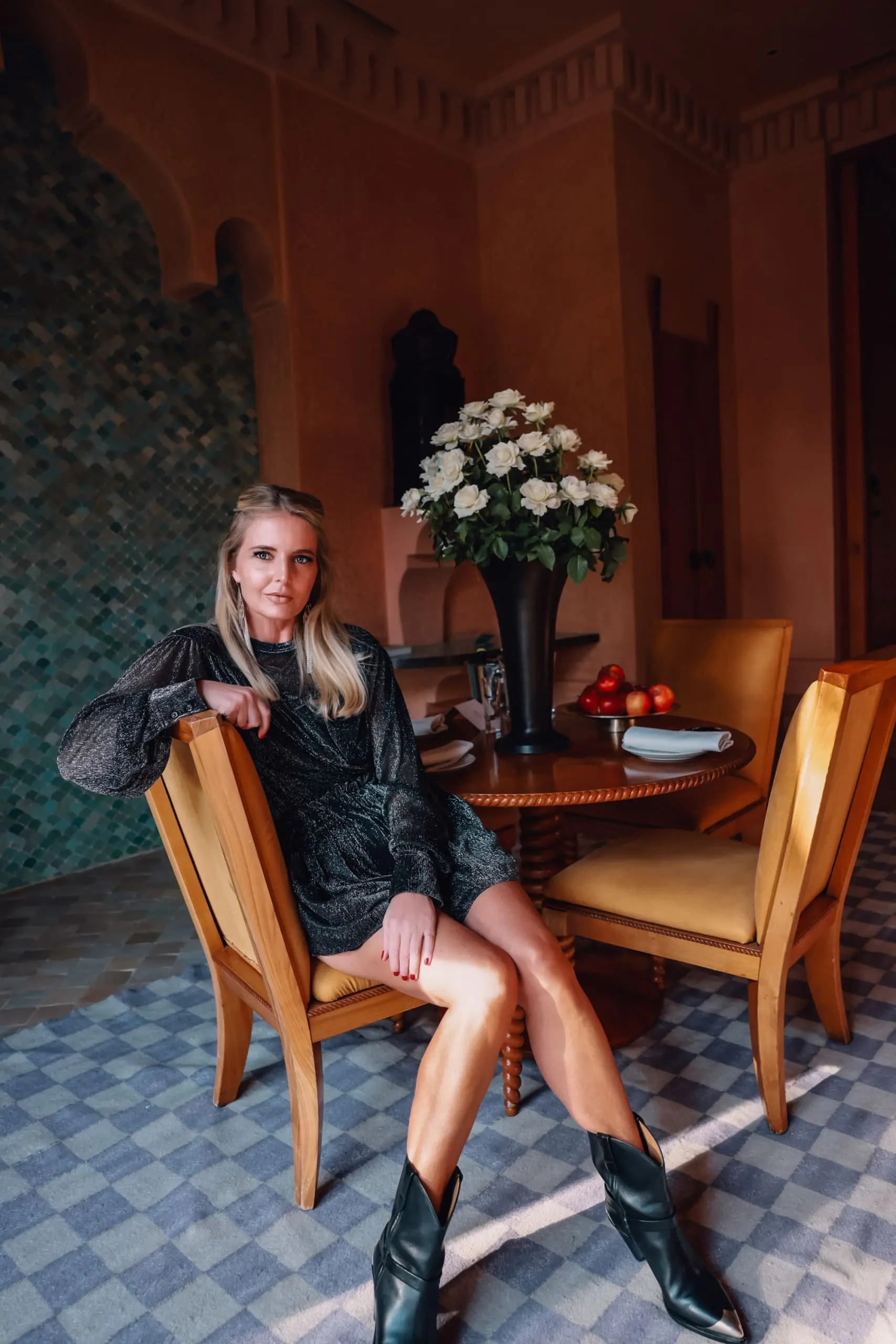 holiday outfit ideas over 40, IRO metallic shorts matching set with Isabel Marant black and silver western boots on fashion over 40 blogger Erin Busbee