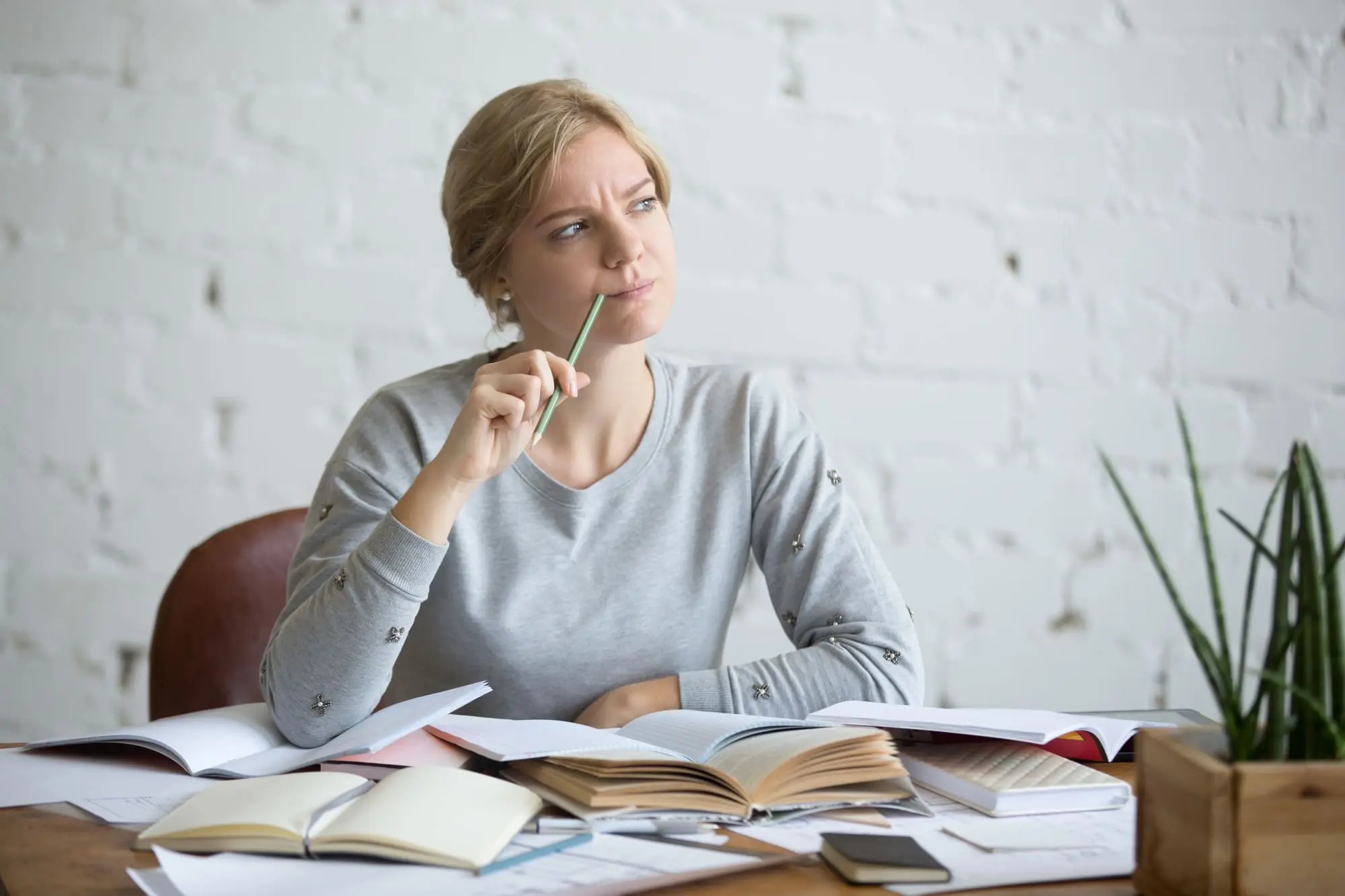 things no one tells you about menopause, menopause questions, menopause women over 40, student woman sitting at the desk
