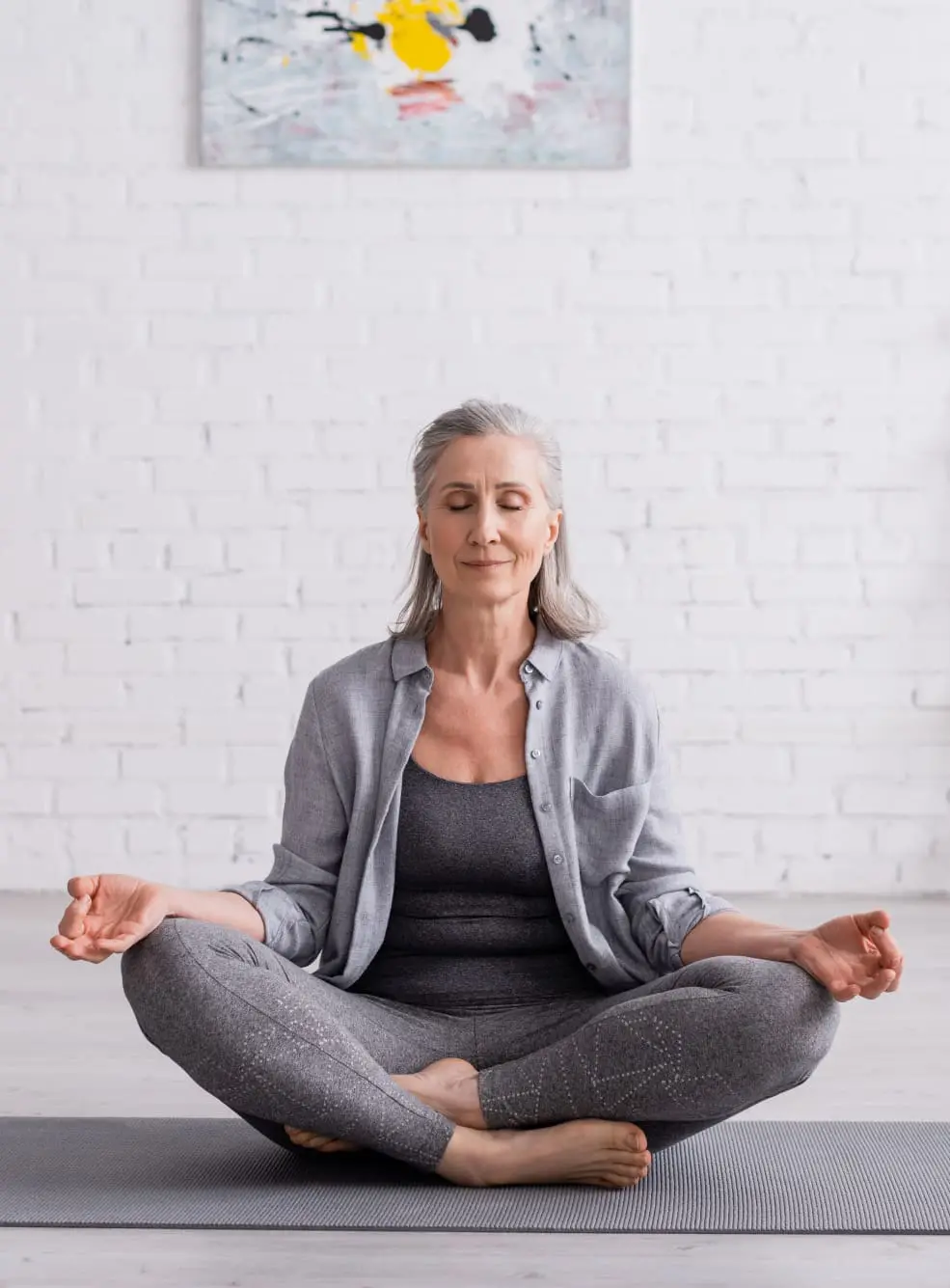 Self-care Guide, self-care habits, self-care in the new year. wellness in the new year, Woman in Grey Meditating